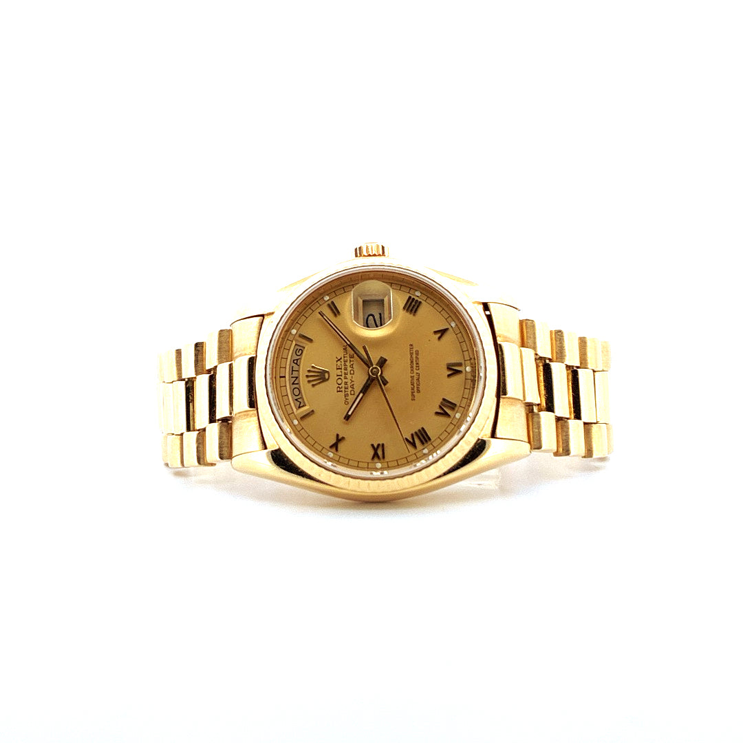 Rolex Day-Date 36mm Gelbgold mit goldenem Zifferblatt, römischen Ziffern und Datumsanzeige