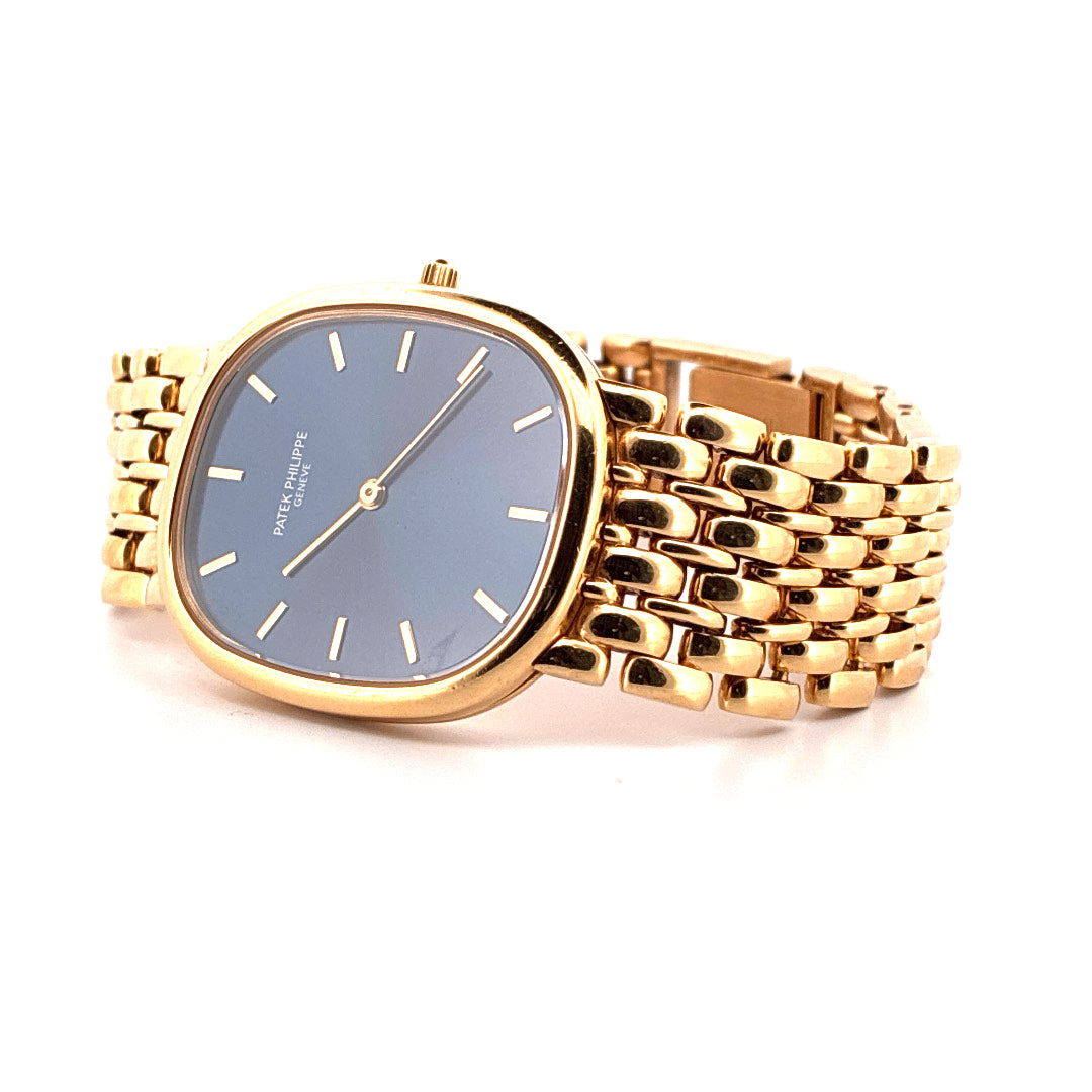 Patek Philippe Ellipse d'Or Gelbgold mit dunkelblauem Zifferblatt und Armband, weisser Hintergrund