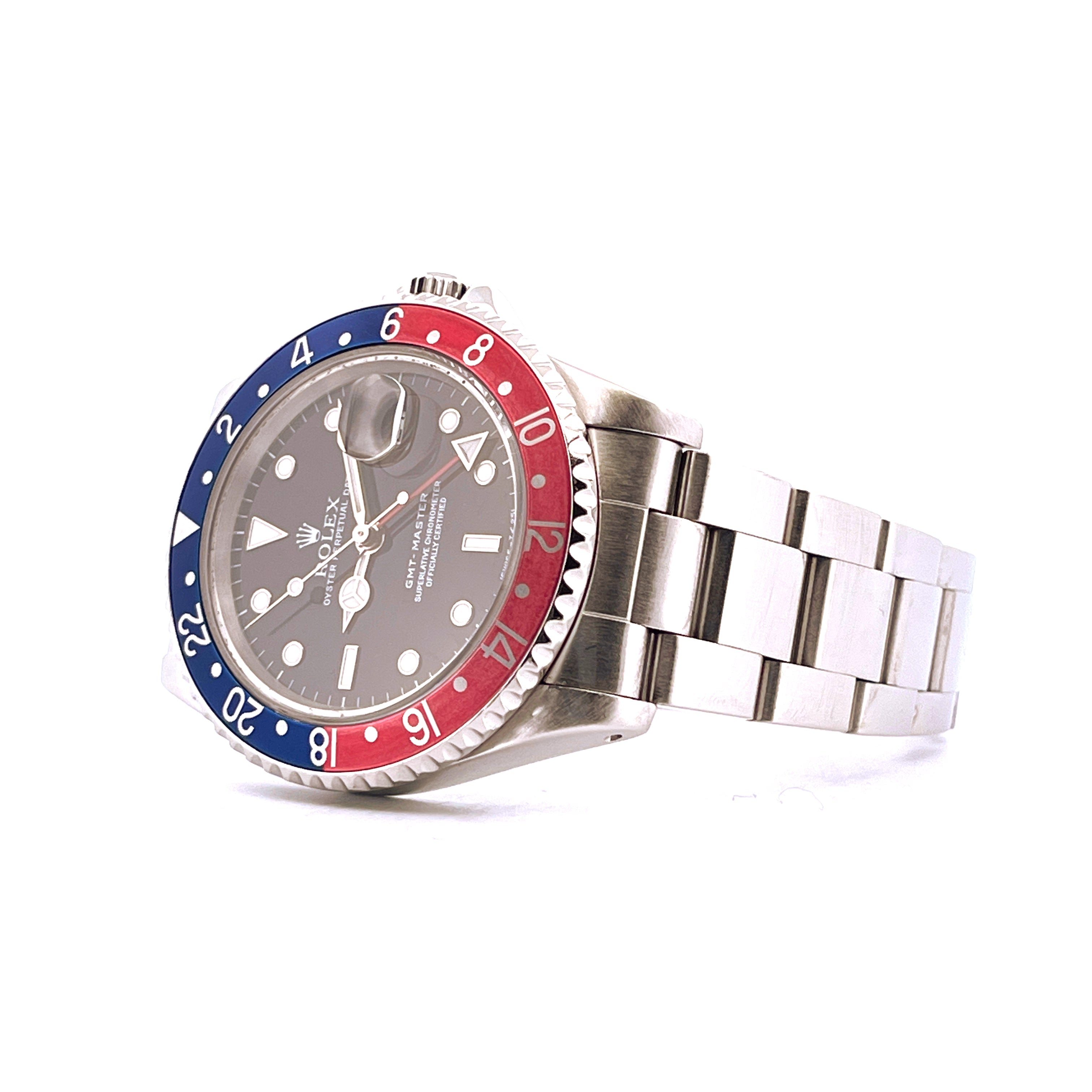 Rolex GMT-Master Ref. 16700 Oyster Stahl mit blau-roter Lünette im Detail auf weißem Hintergrund