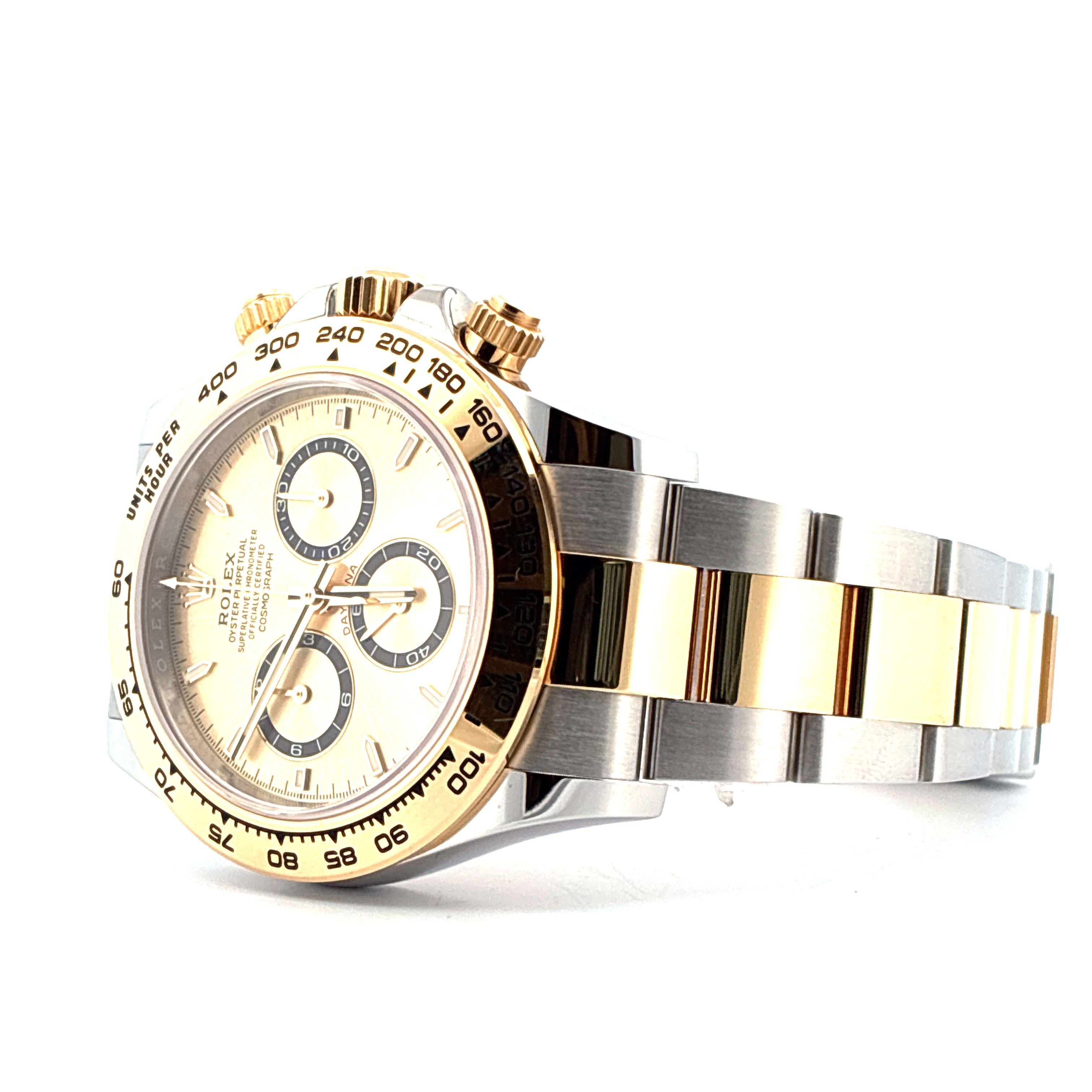 Rolex Daytona Stahl-Gold im Seitenprofil mit Zifferblatt und bicolor-Armband