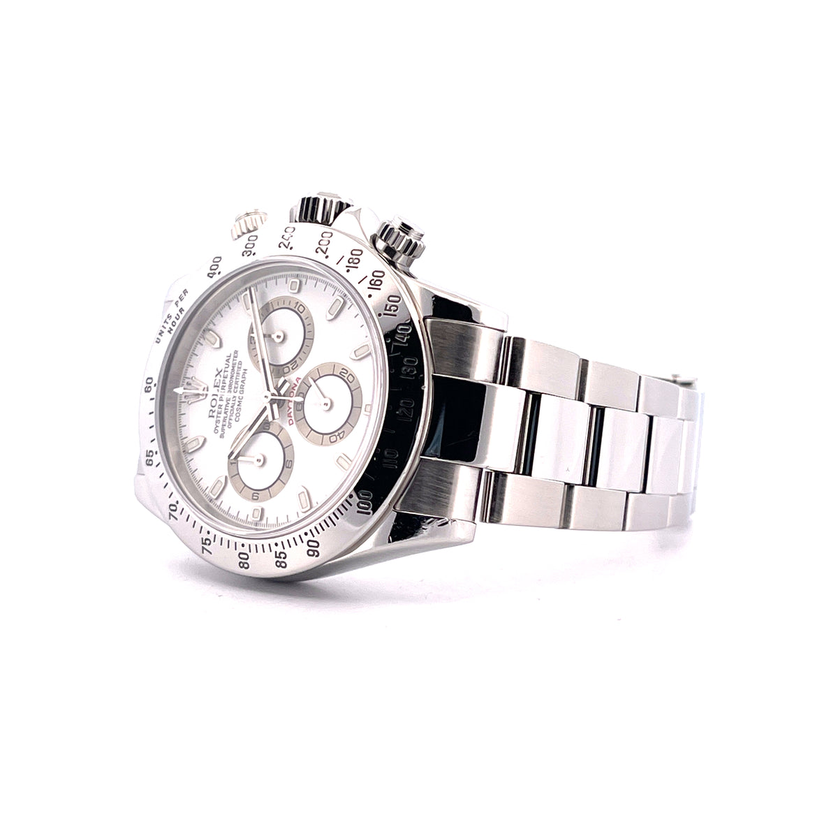 Rolex Daytona white Dial 116520 / very good Condition / Full Set / LC100 / 2002, Schrägansicht mit Zifferblatt, Krone und Armband vor weißem Hintergrund