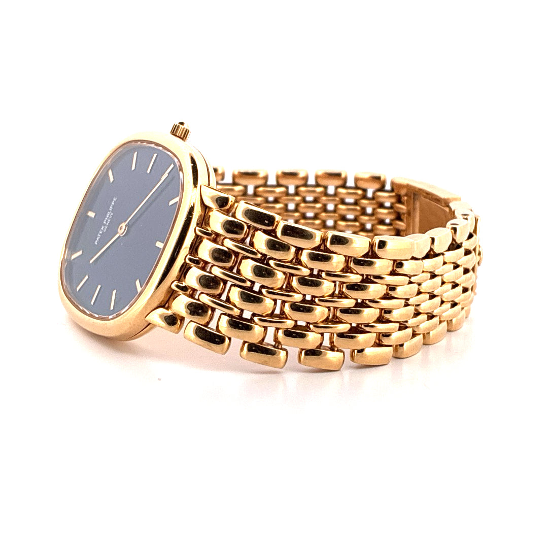 Patek Philippe Ellipse d´Or Gelbgold im Seitenprofil vor weissem Hintergrund