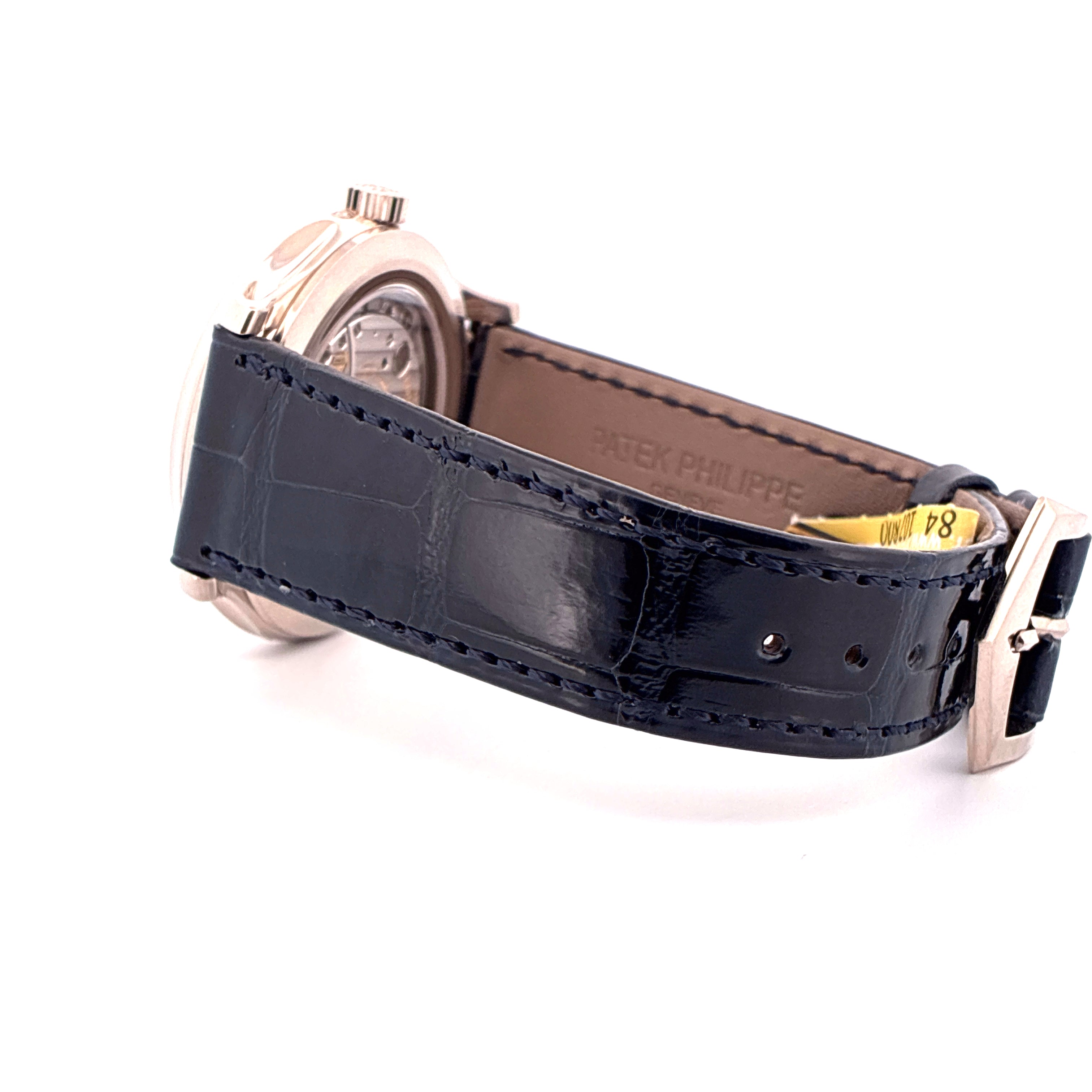 Patek Philippe Armbanduhr, Seitenansicht, schwarzes Krokodillederband mit weißer Goldschließe