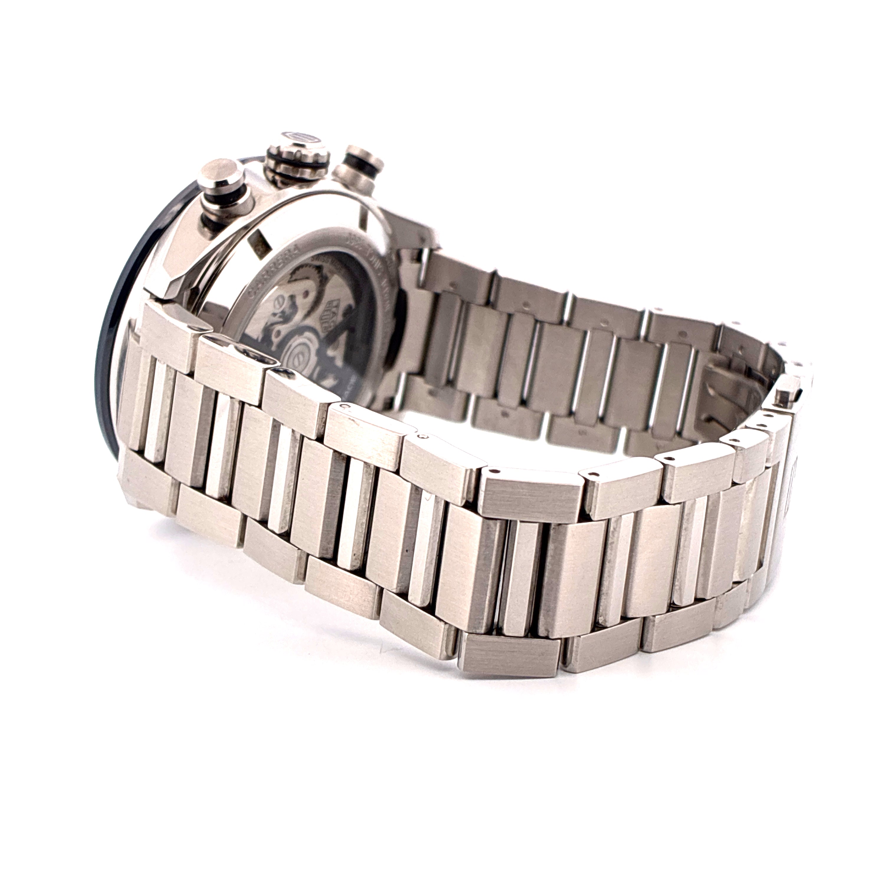 Tag Heuer Carrera Stahl mit Automatikwerk und schlichtem Stahlarmband seitlich fotografiert