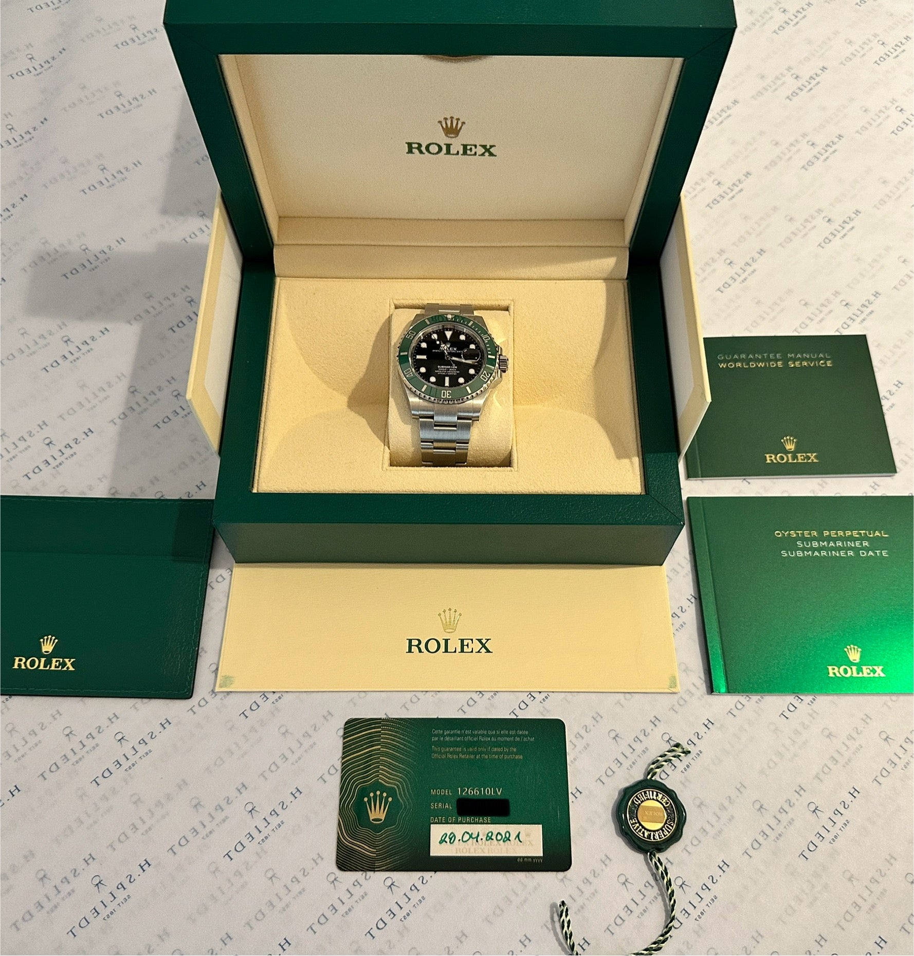 Rolex Submariner Date 41 mm Stahl Automatik im grünen Rolex-Etui mit Garantiekarte