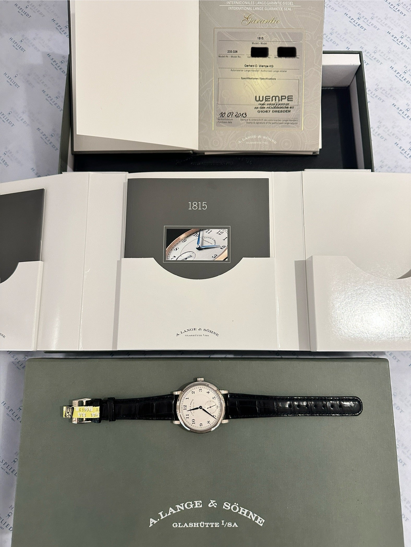 A. Lange & Söhne 1815 Weißgold auf dunklem Karton, mit Garantiekarte und Box