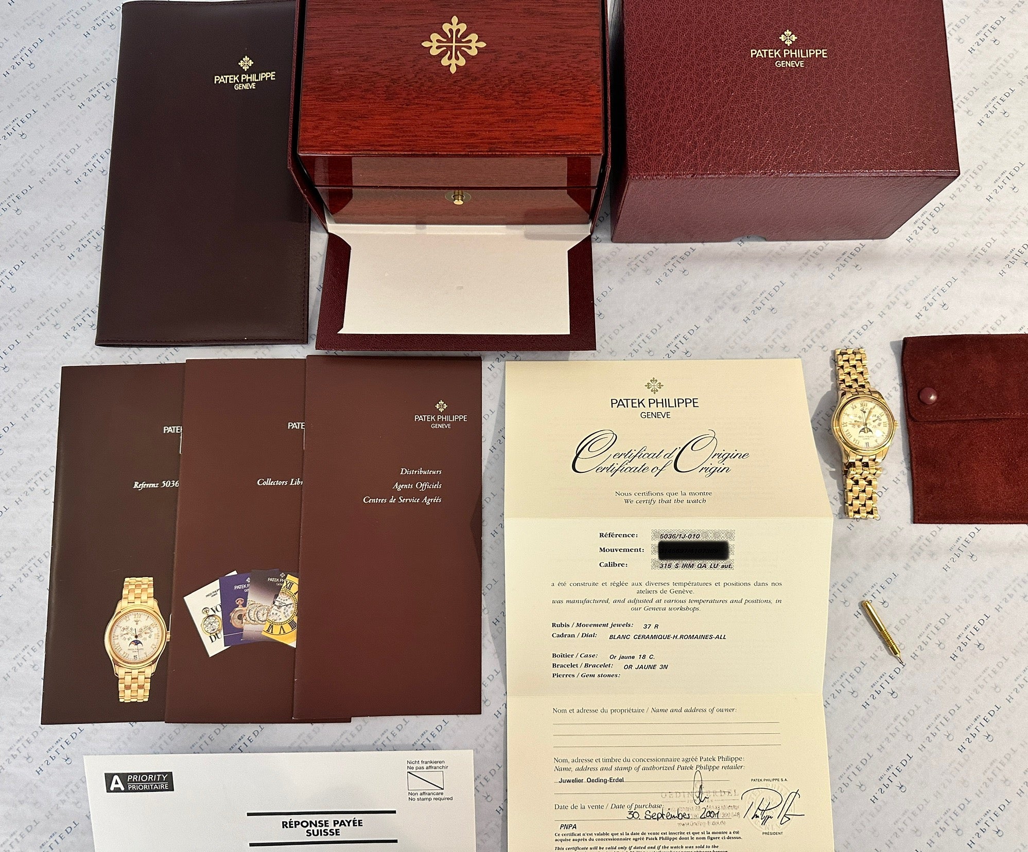 Patek Philippe Annual Calendar 5036/1J Gelbgold Herrenuhr mit Papieren und Box