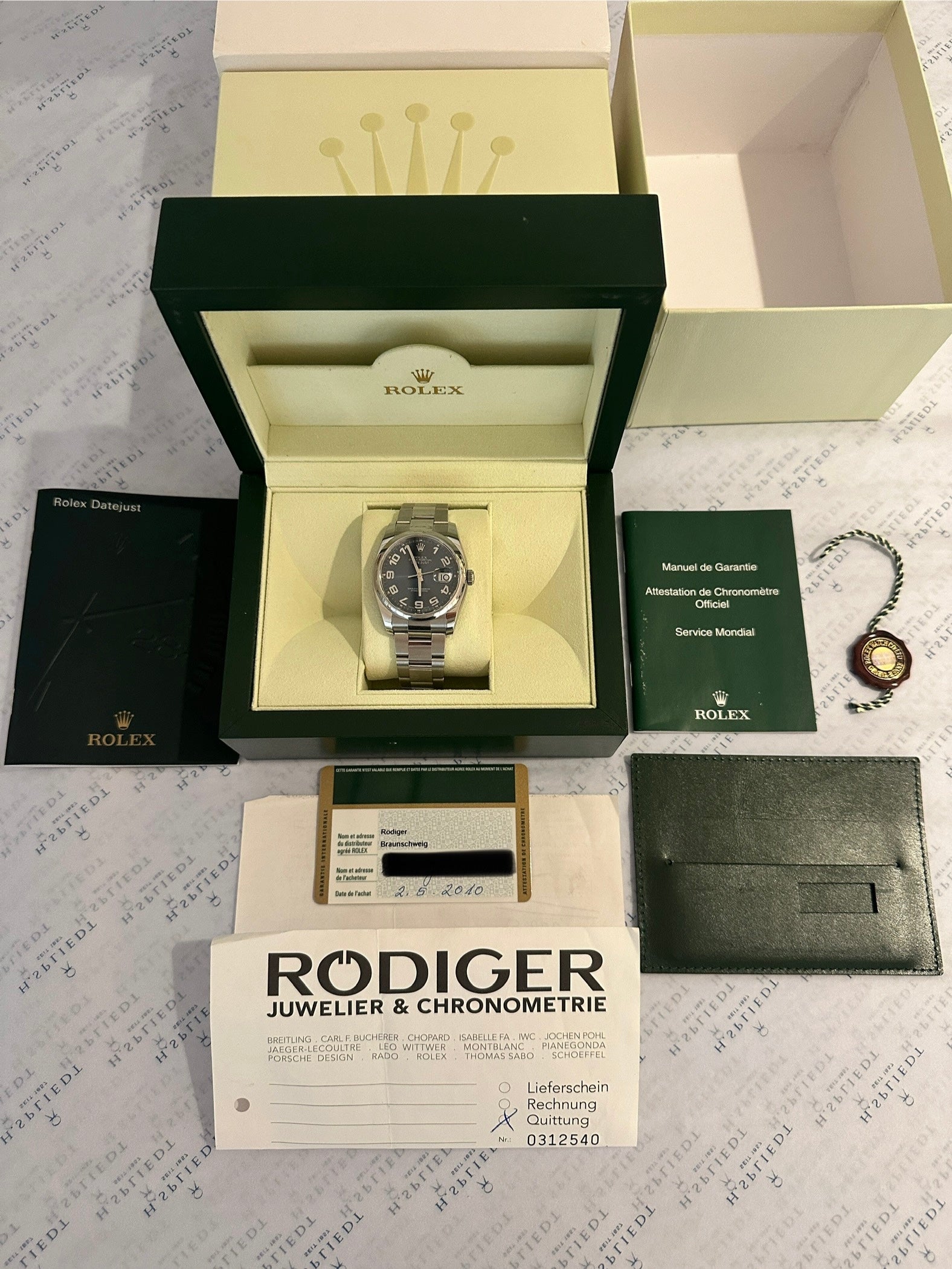 Rolex Datejust 36 mm Stahl Automatik mit schwarzem Zifferblatt in der originalen Verpackung