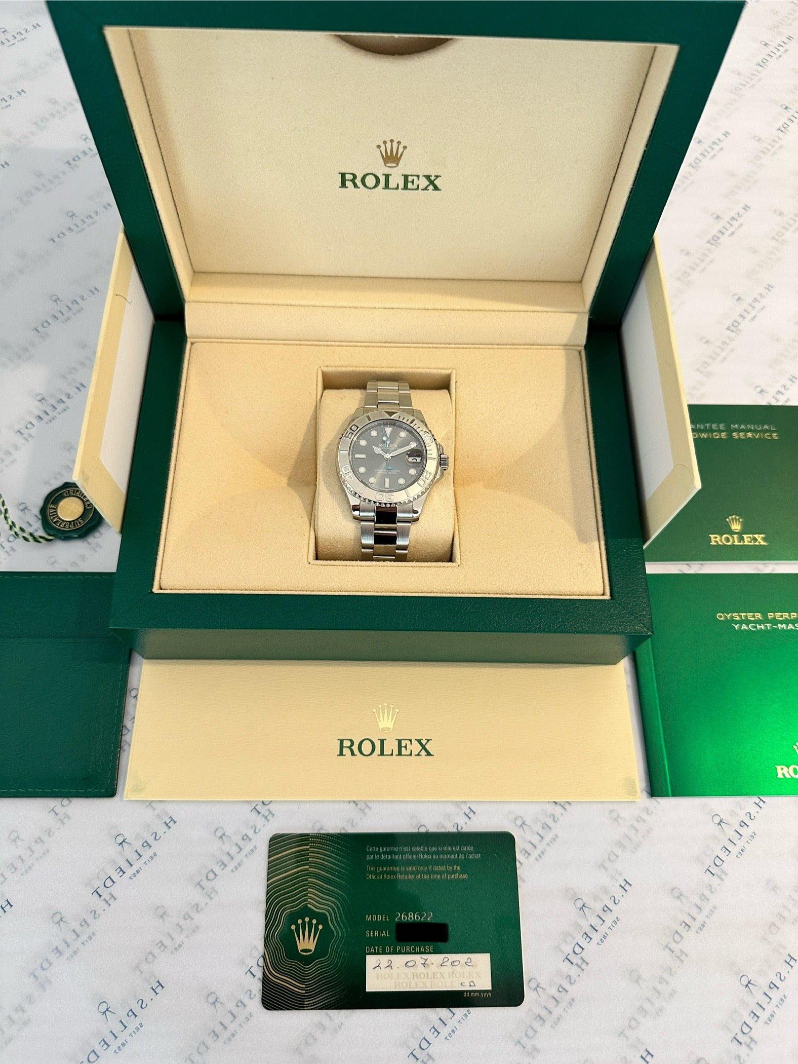 Rolex Yacht-Master 37 Rhodium Automatik in Edelstahl mit Dokumenten im geöffneten Karton