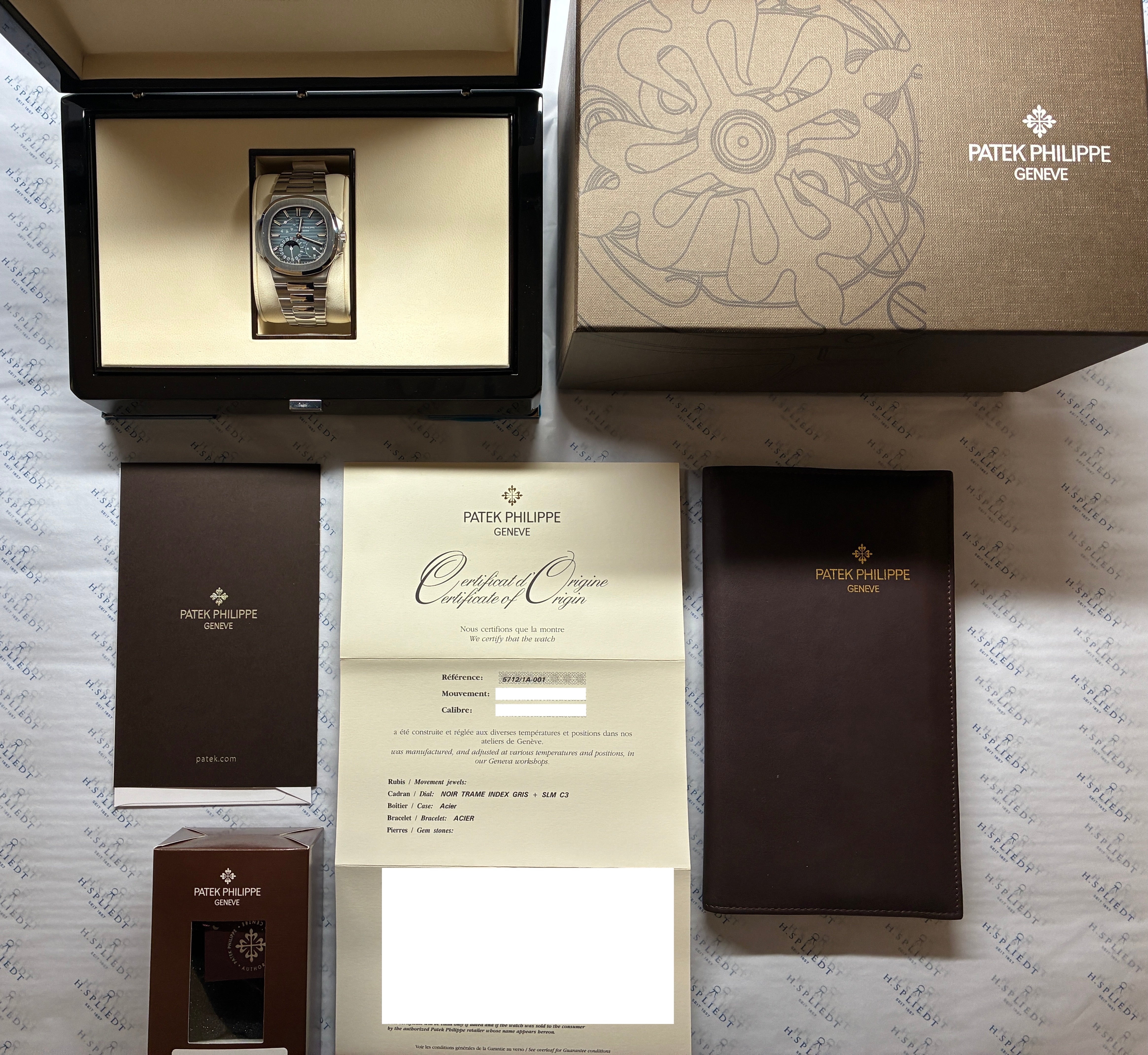 5712/1A-001 / very good Condition / Date - Moonphase - Power-Reserve / Patek Service 2025 / Blue Dial / Full-Set / Germany 2007