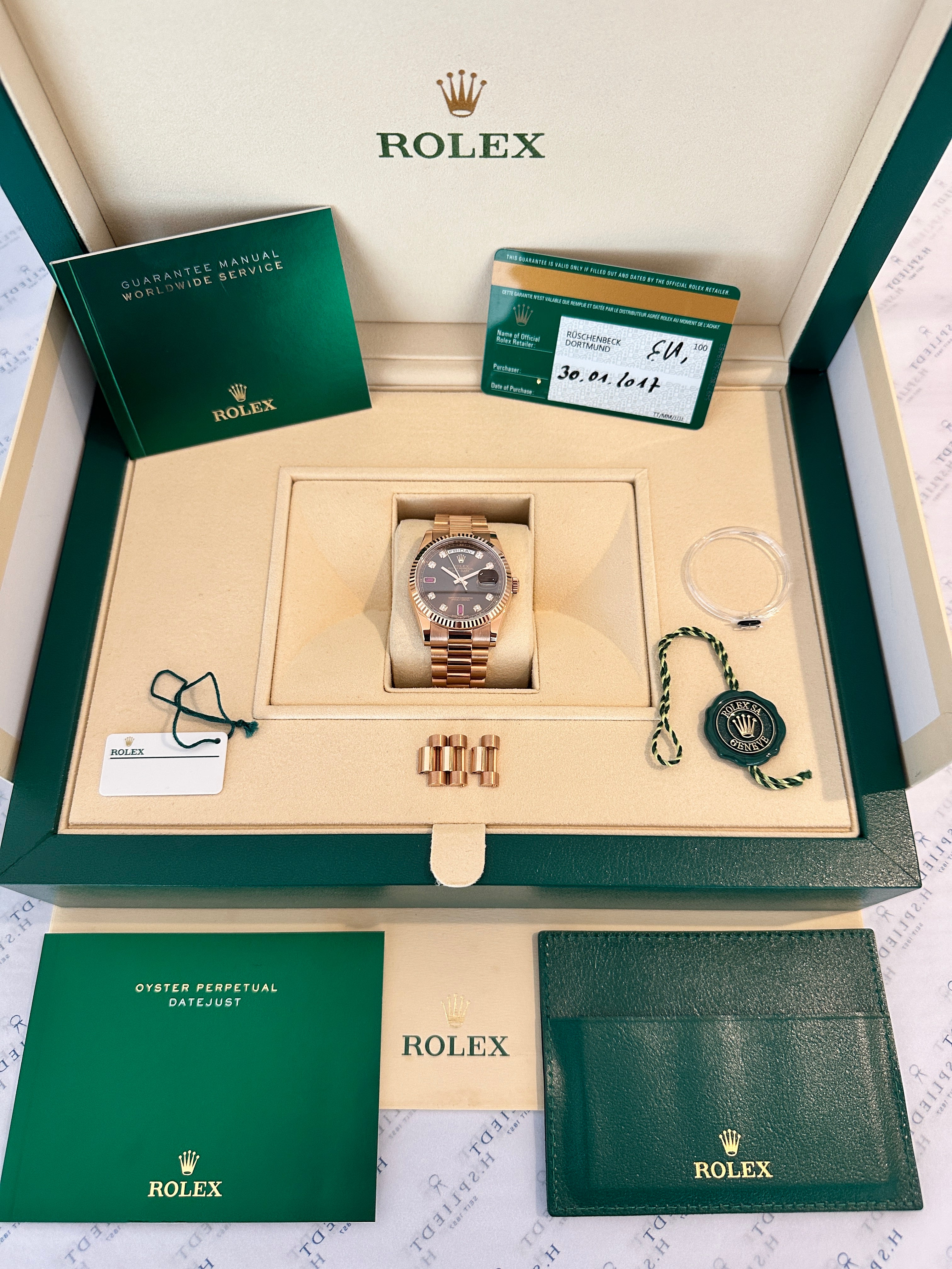 Rolex Day-Date 36 Roségold mit Schokoladen-Zifferblatt und Diamanten in einer originalen Box
