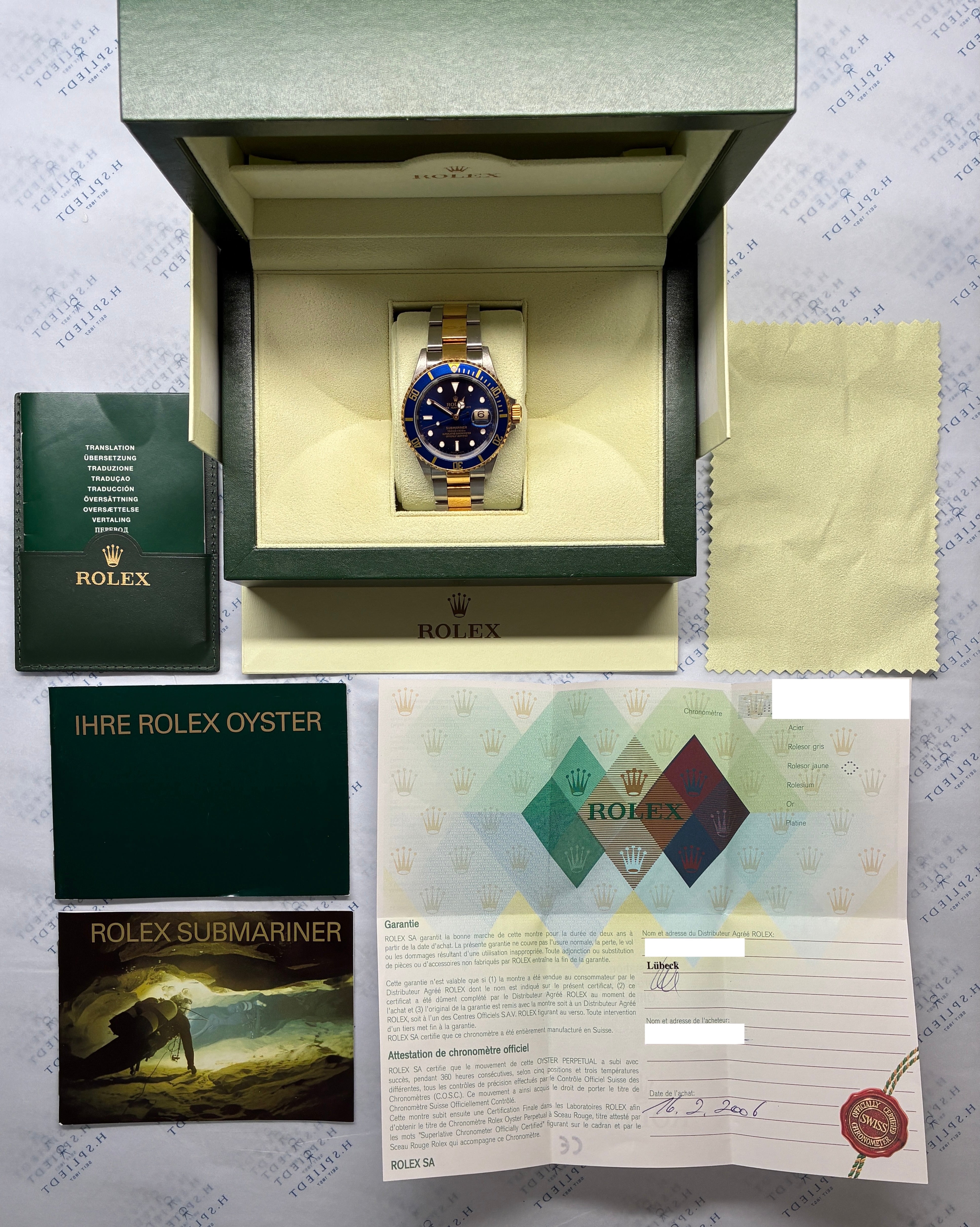 Rolex Submariner Date Bicolor 2006 im Full-Set mit Box und Papieren, das Zifferblatt hat 11 Indexe