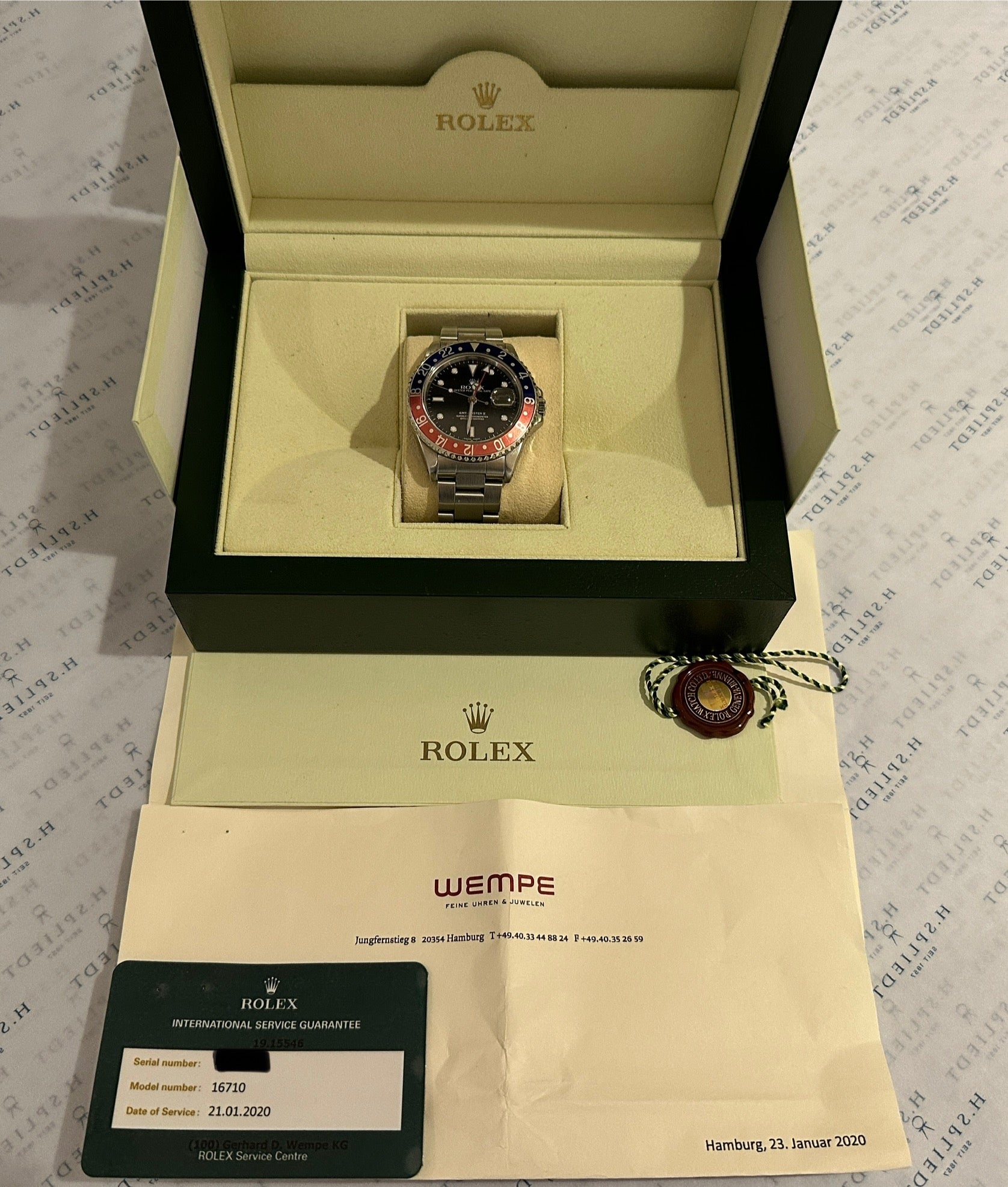 Rolex GMT-Master II Pepsi 16710 im geöffneten Originalkarton mit Papieren