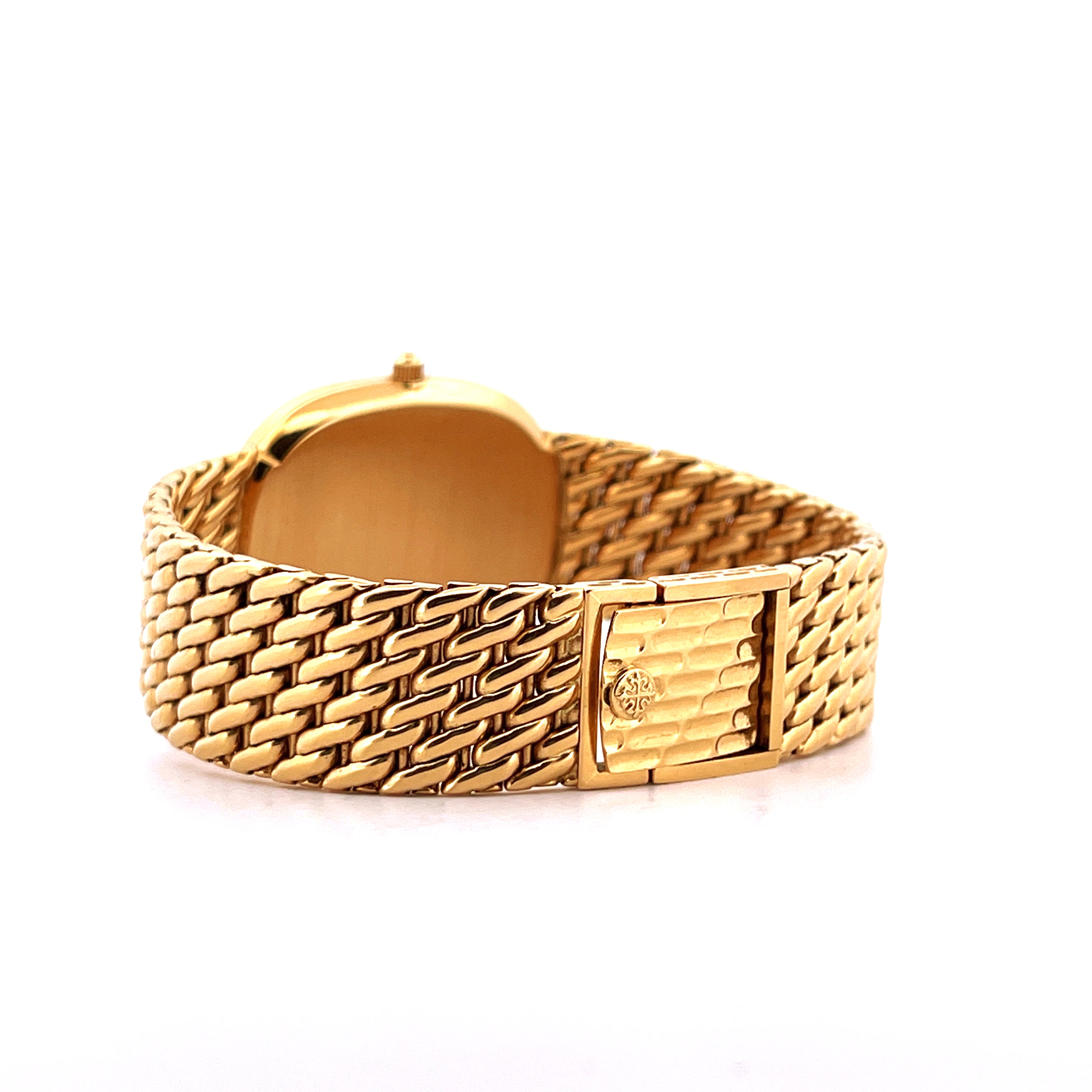 Patek Philippe Ellipse 18kt Gelbgold mit charakteristischem geflochtenem Armband und Schließe