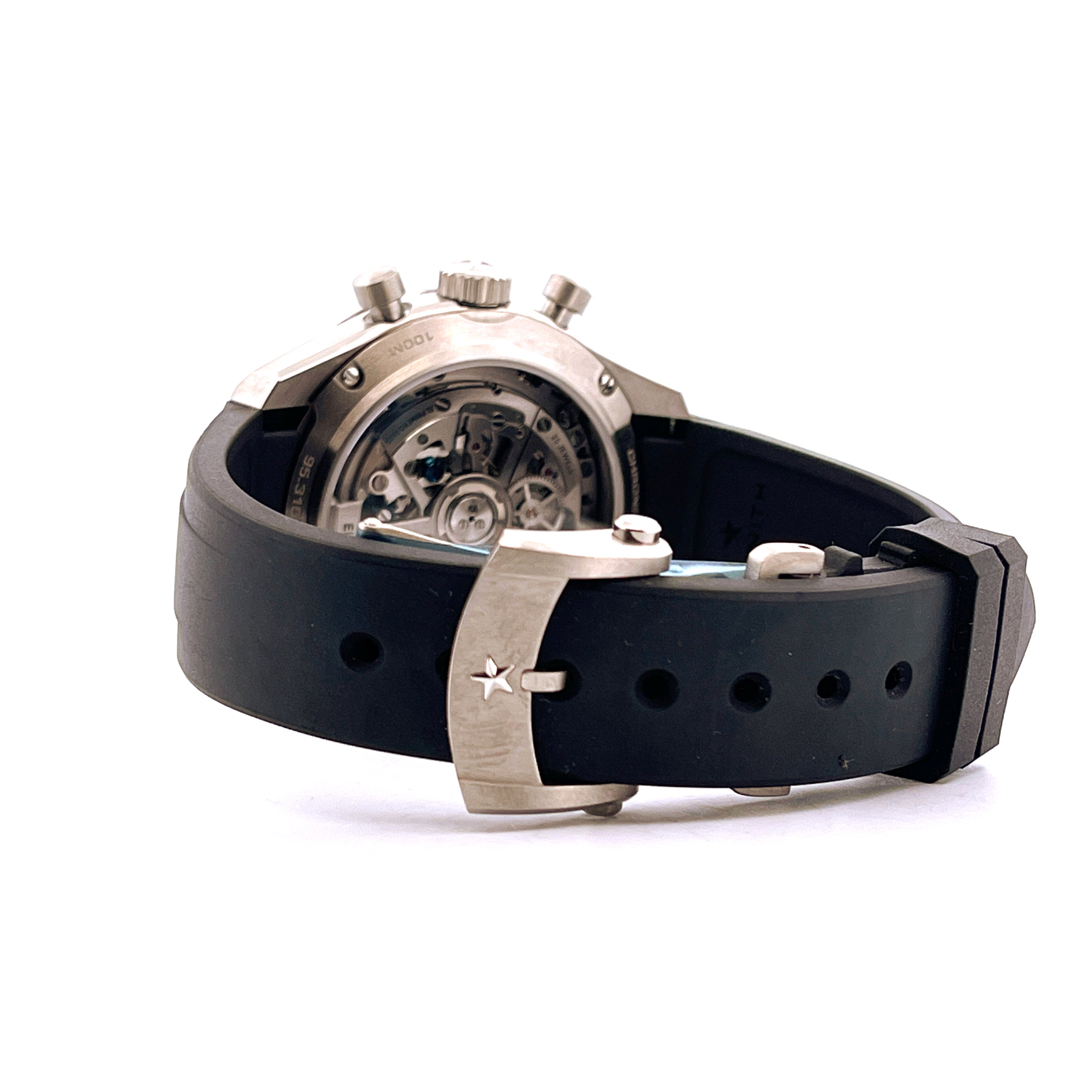 Zenith Chronomaster Sport Titan Rückseite mit offenem Uhrwerk und schwarzem Kautschukarmband mit Sternschließe