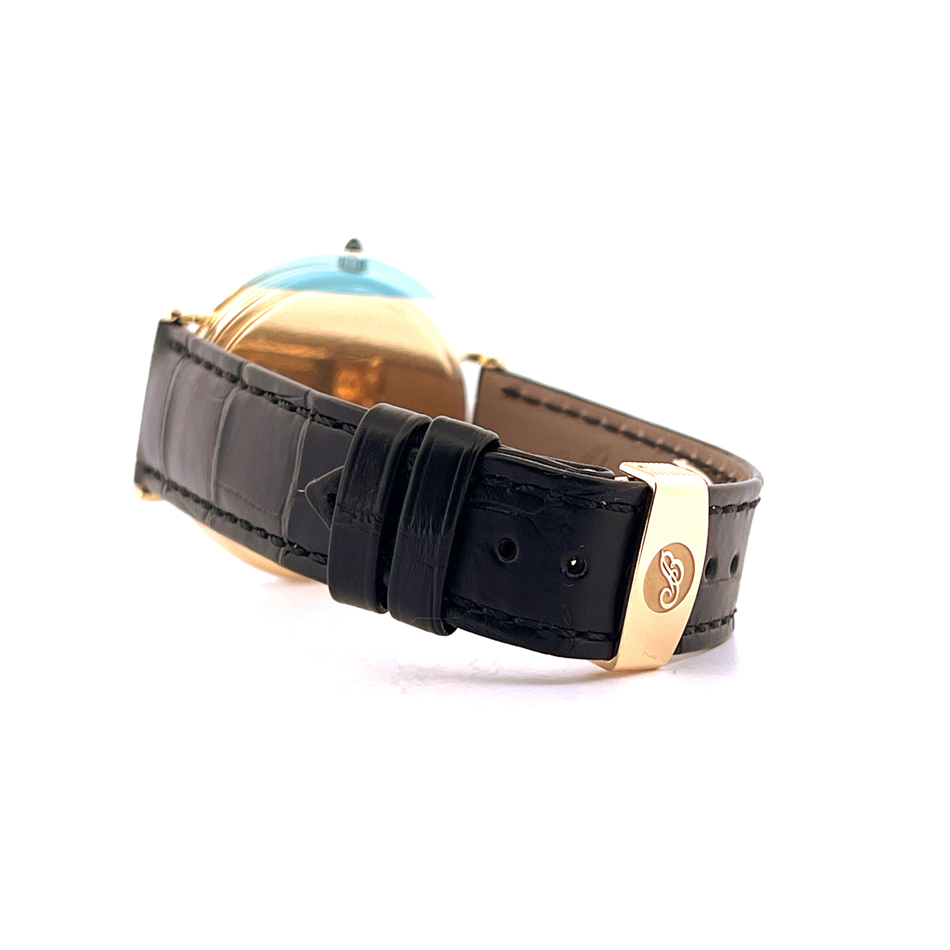 Seitenansicht einer Breguet Classique Gelbgold-Uhr mit schwarzem Krokodillederarmband und goldener Schließe