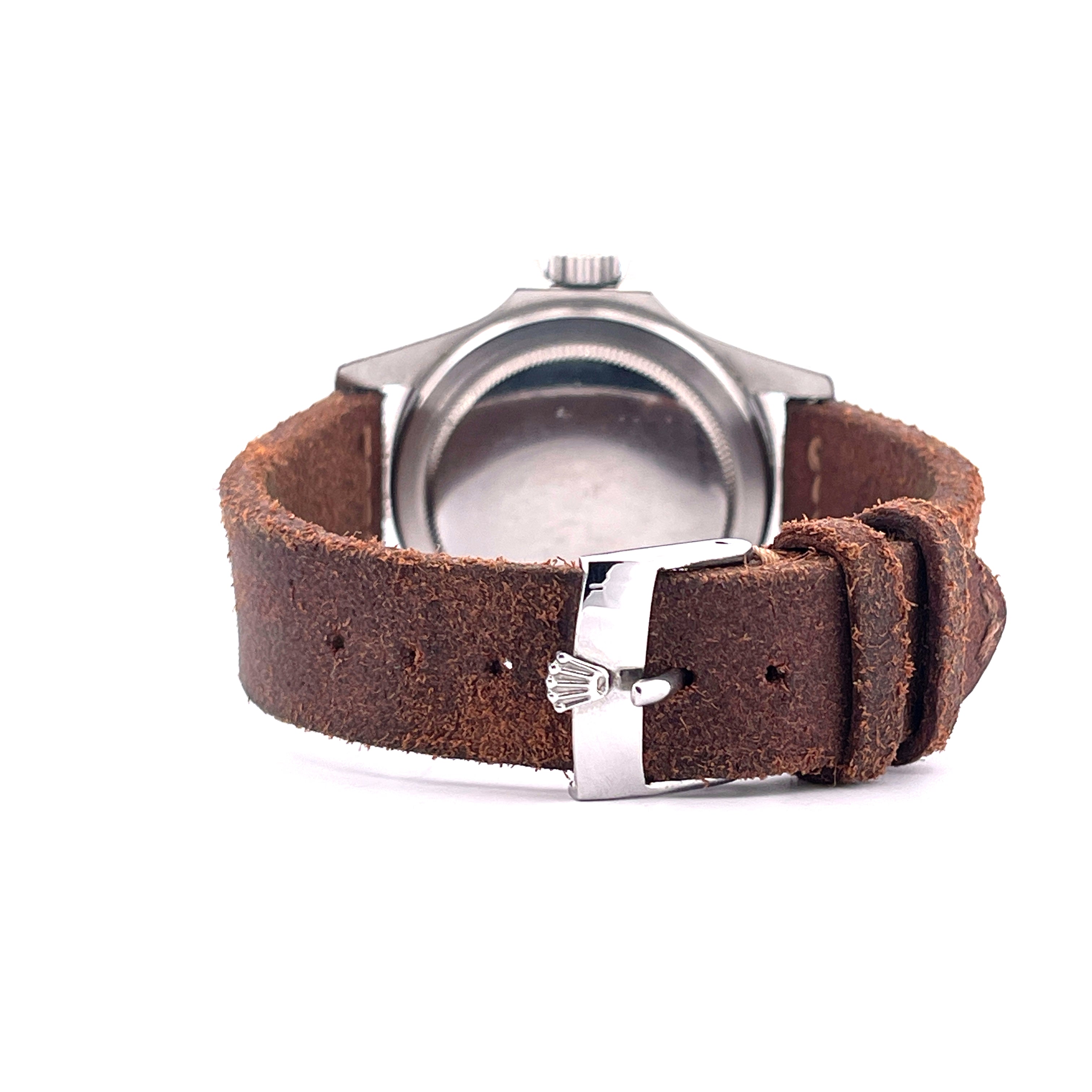 Rückansicht einer gebrauchten Rolex Submariner Ref. 5512 mit braunem Lederband und silberner Schließe