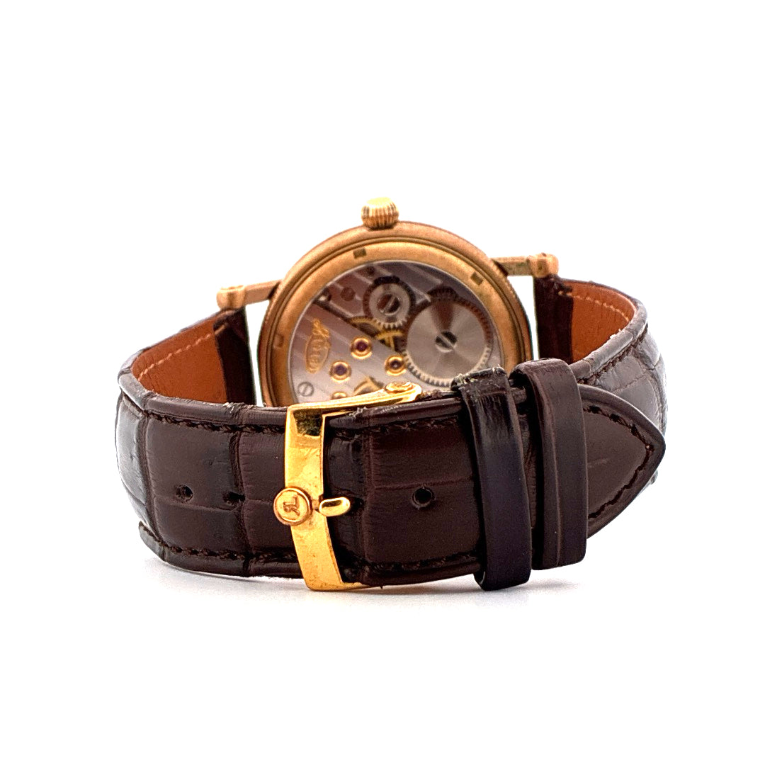 Choswiss Regulateur Bronze 2025 Rückansicht mit goldenem Dornschließe und braunem Lederarmband