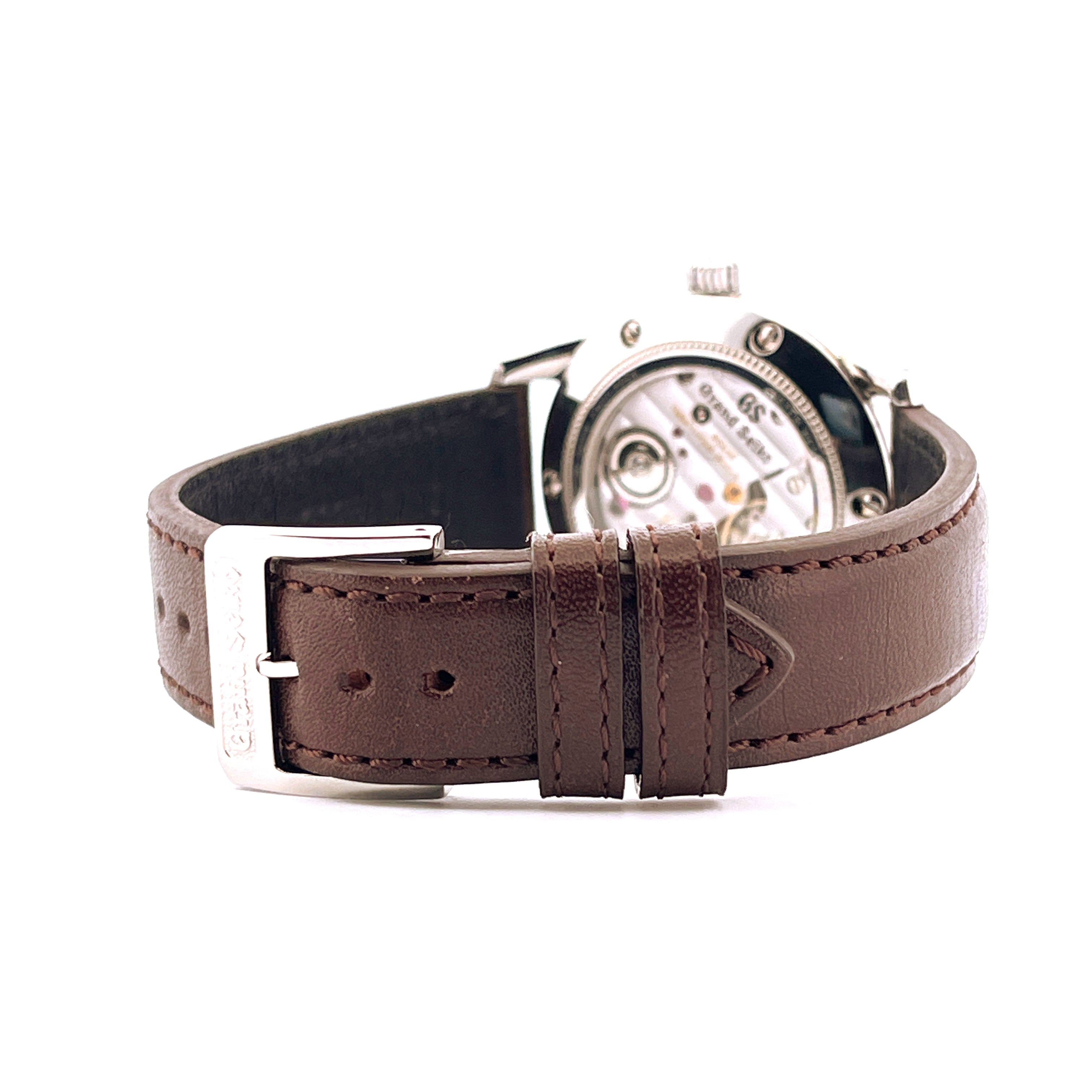 Grand Seiko Heritage 2025 Rückseite mit braunem Lederarmband und silberner Schließe