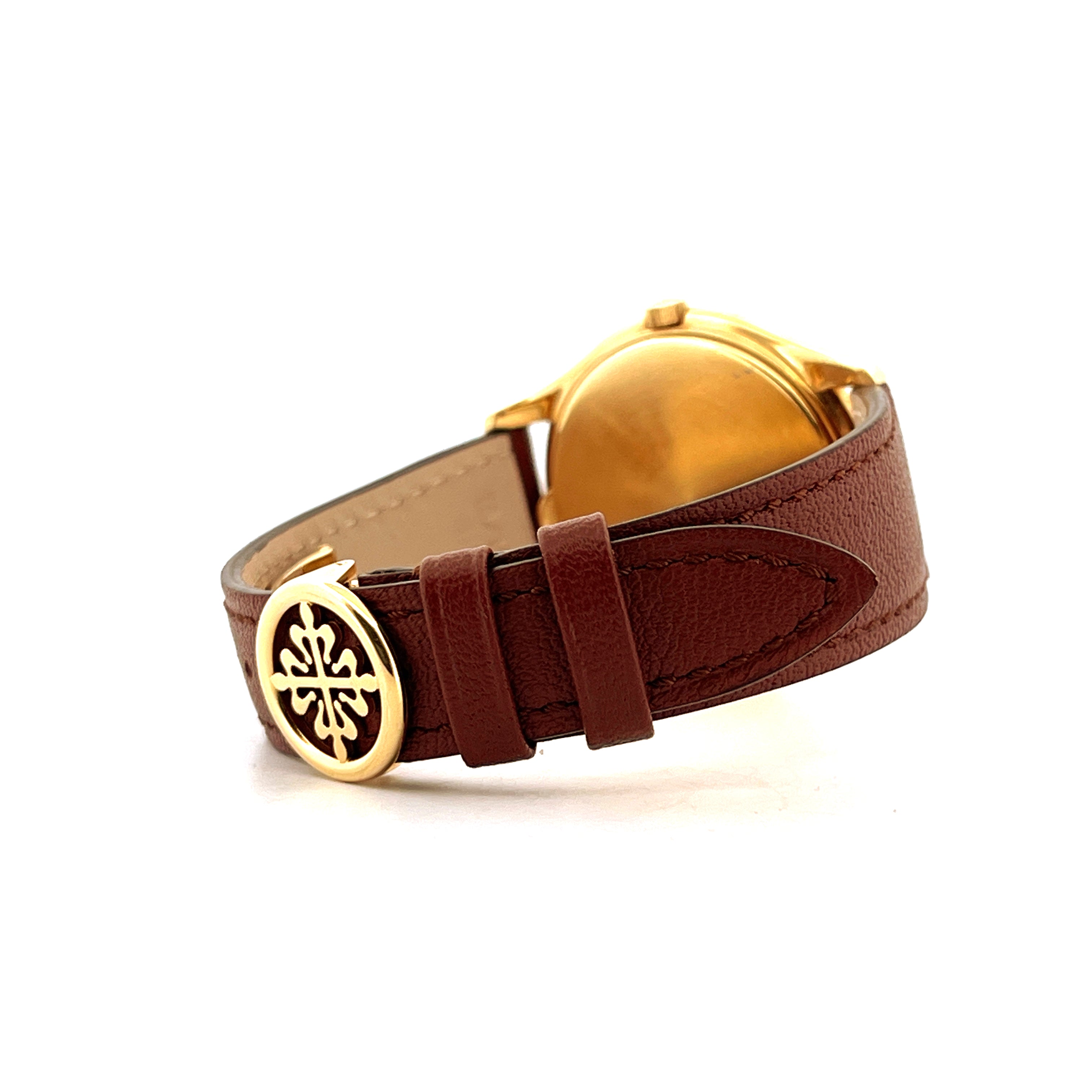 Patek Philippe Perpetual Calendar 3940J-017 Seitenansicht mit braunem Lederarmband und goldenem Patek-Emblem