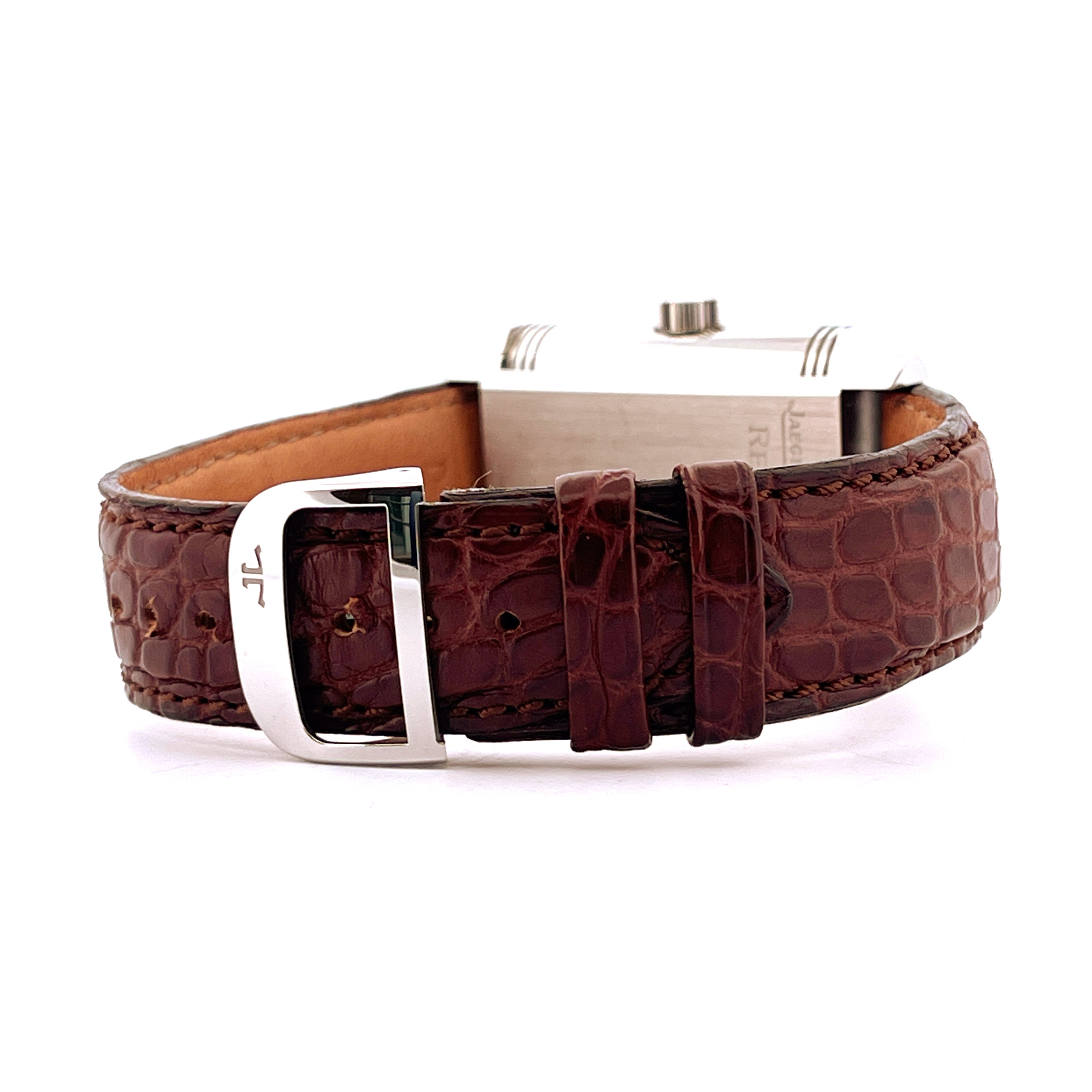 Seitenansicht eines Jaeger-LeCoultre Reverso Grande Panorama Uhr mit braunem Alligatorlederarmband und polierter Edelstahl…