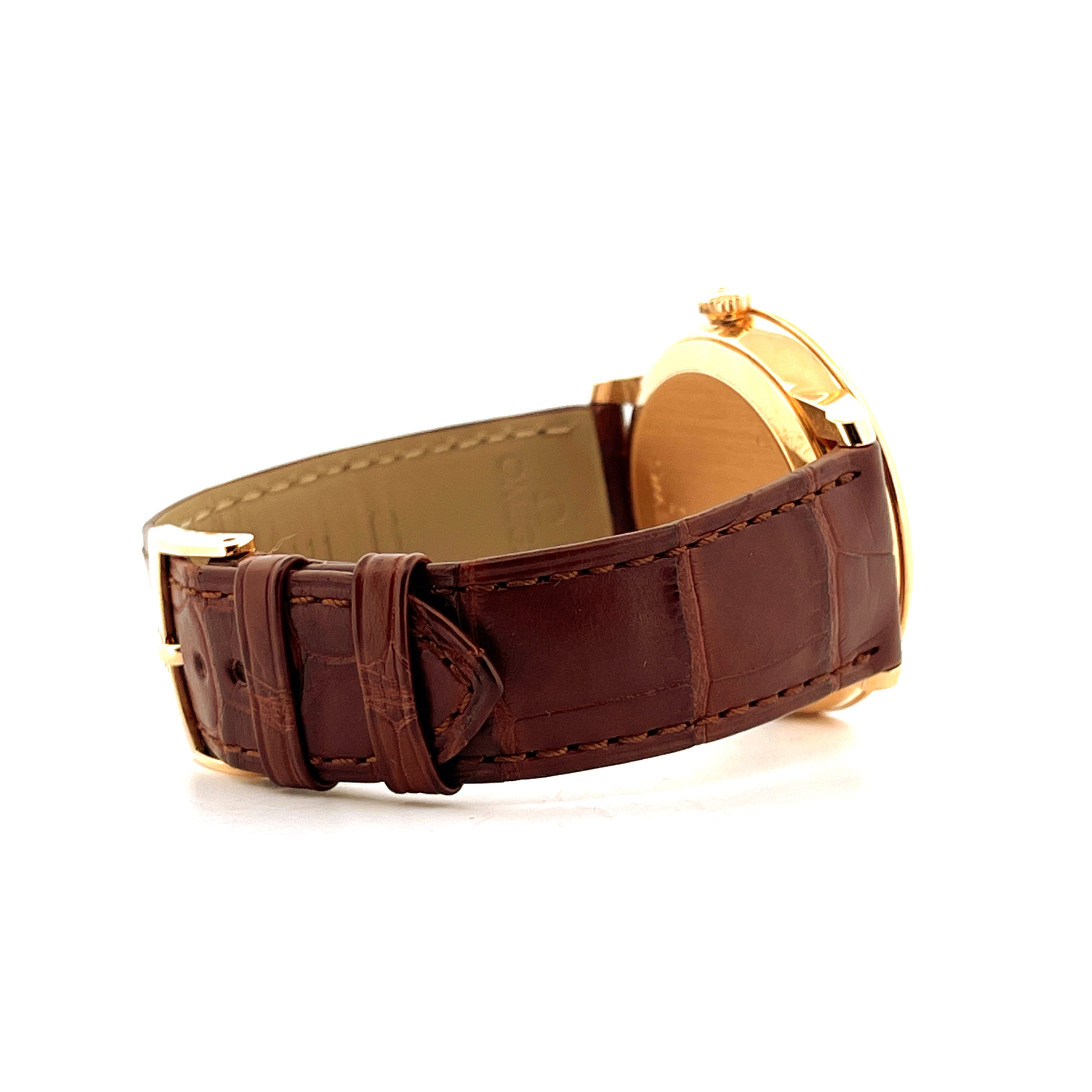 Seitenansicht einer Omega De Ville Prestige Date Uhr aus Gelbgold mit braunem Lederarmband