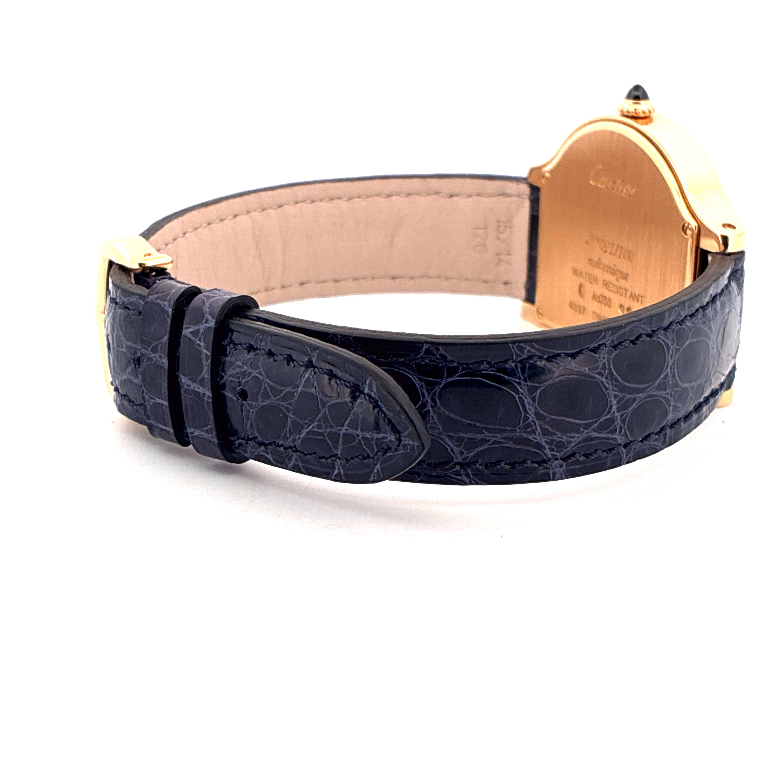 Seitenansicht einer Cartier Cloche De Cartier aus Gelbgold mit blauem Krokodilarmband