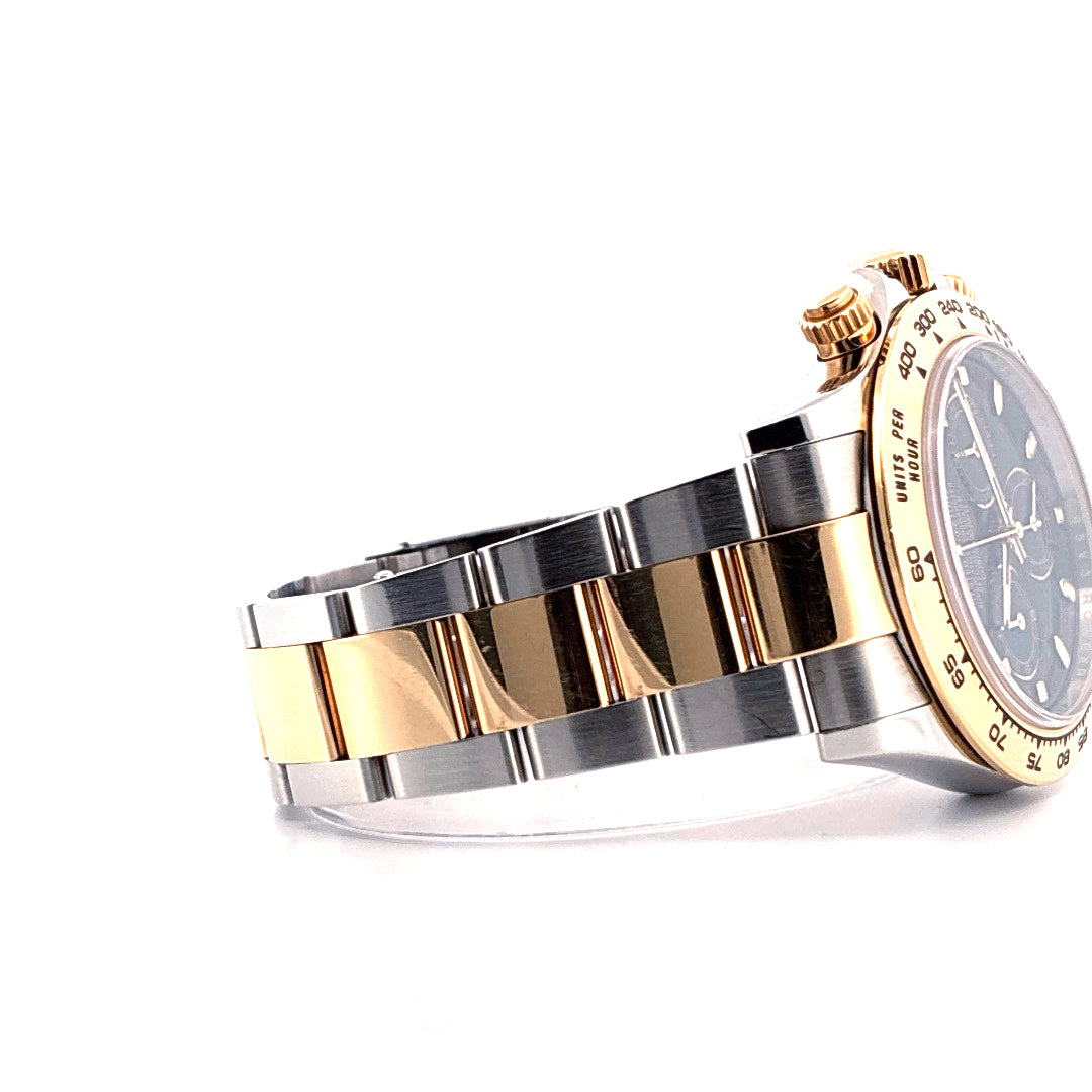 Rolex Daytona Bicolor 2016 Seitenansicht mit bicolor Stahl-Gold-Armband und Tachymeterskala