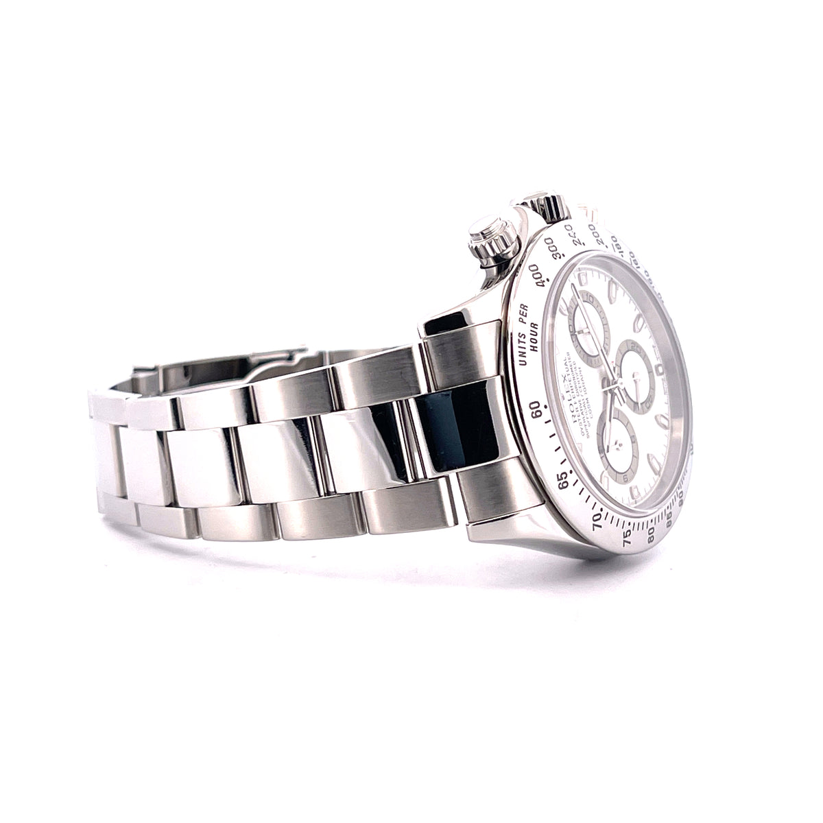 Rolex Daytona white Dial 116520 / very good Condition / Full Set / LC100 / 2002, Schrägansicht mit Armband, Zifferblatt und Krone vor weißem Hintergrund