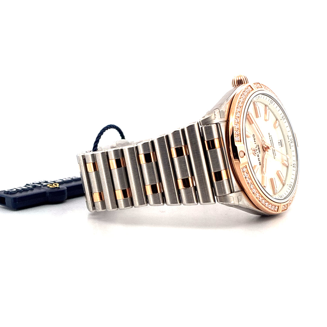 Breitling Chronomat Lady 36mm Stahl mit Roségold Lünette und Diamanten auf weißem Zifferblatt