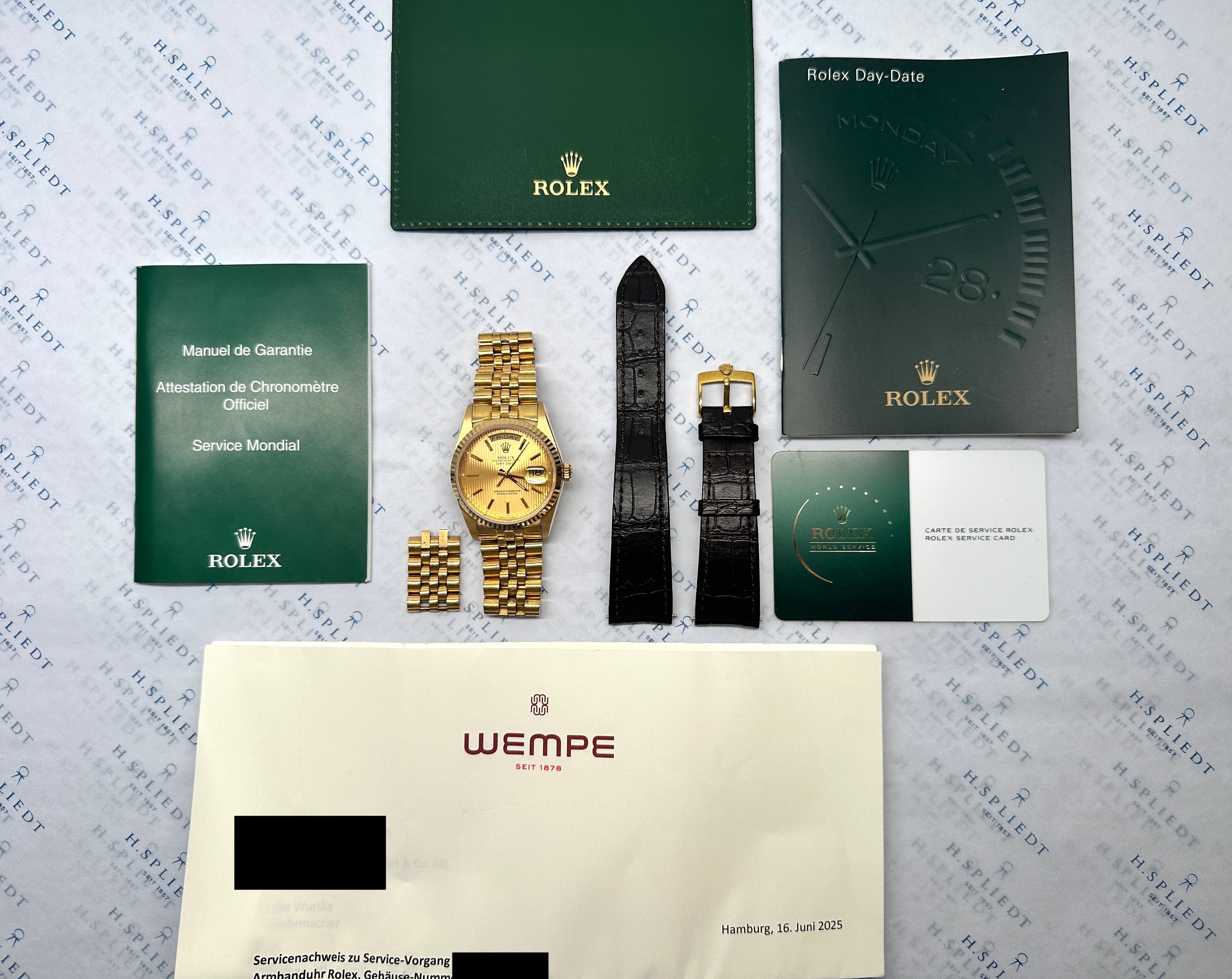 Rolex Day-Date 36 Gelbgold mit Tapestry-Zifferblatt, Garantiekarte, Lederarmband und originaler Verpackung