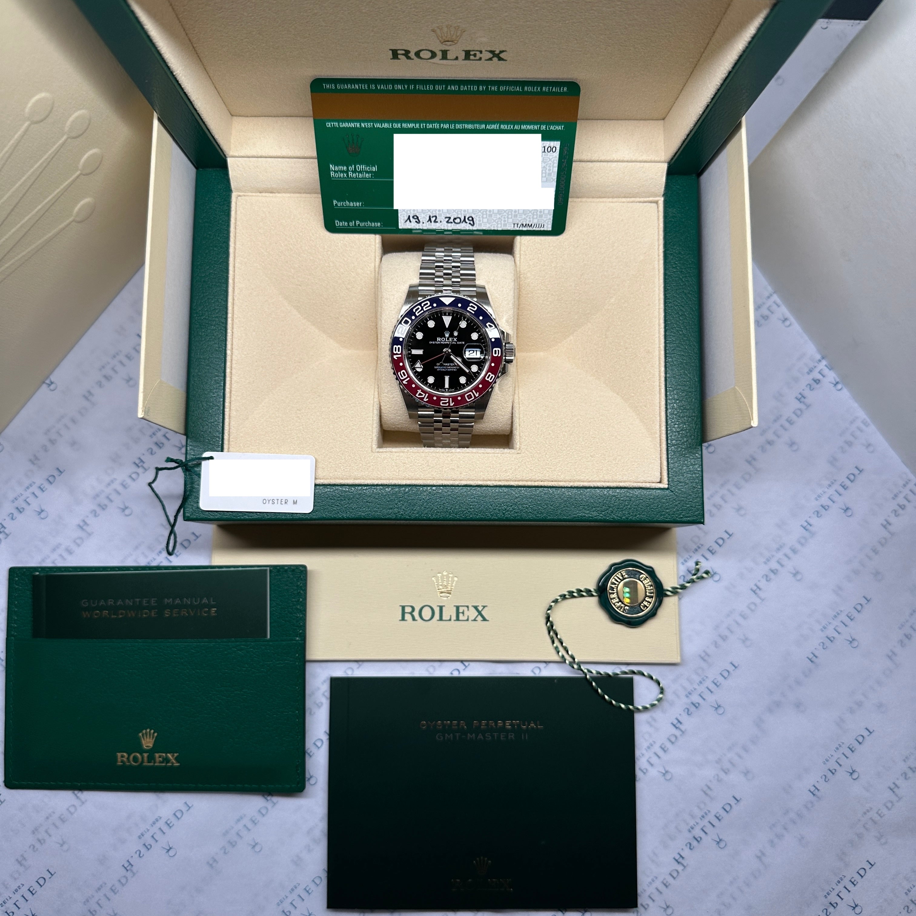 Rolex GMT-Master II Pepsi Jubilee aus Edelstahl in der Originalverpackung mit Garantiekarte und Anleitung