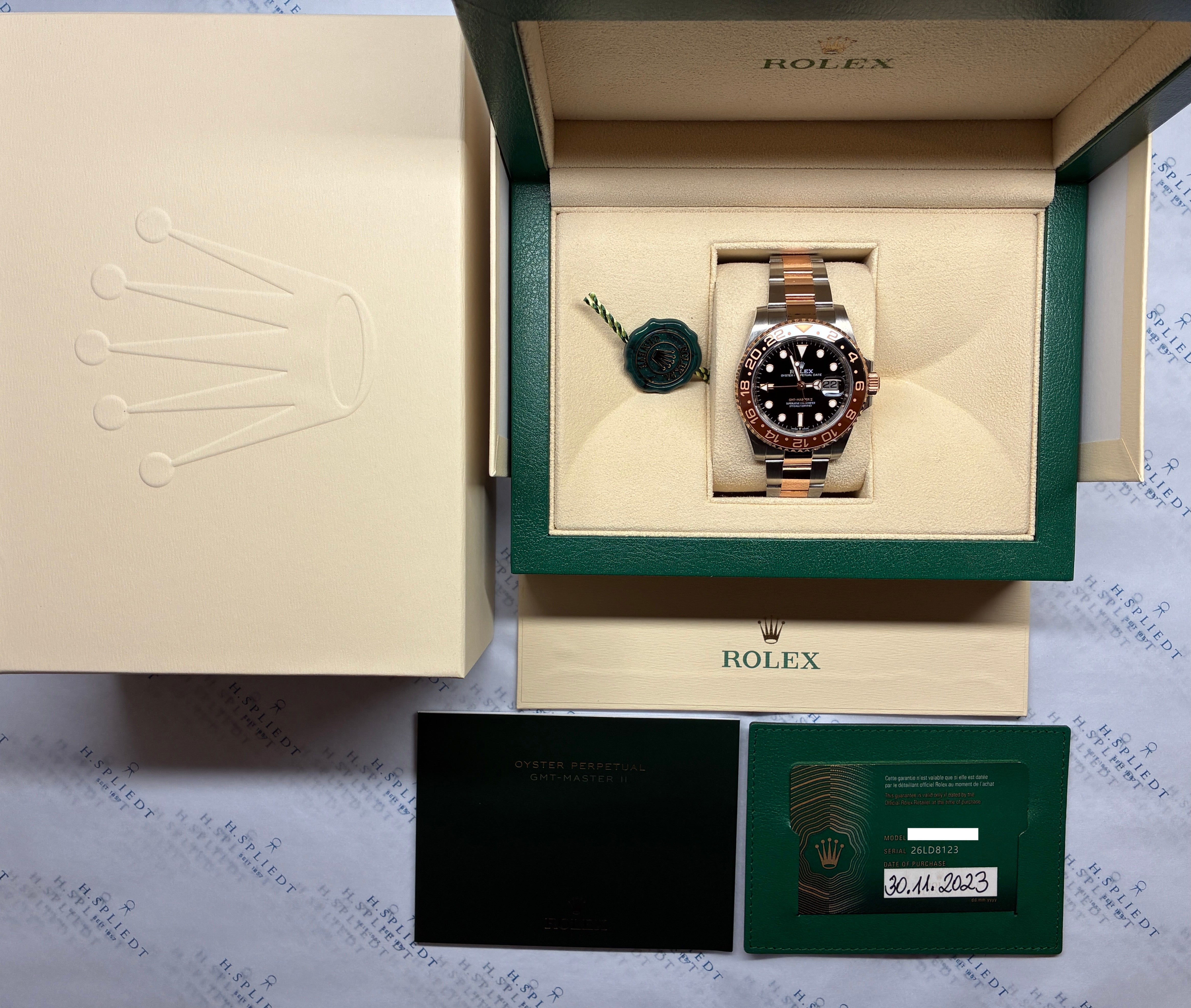 Rolex Oyster Perpetual GMT-Master II Rootbeer in Gold/Stahl Automatik mit schwarzem Zifferblatt im Full-Set