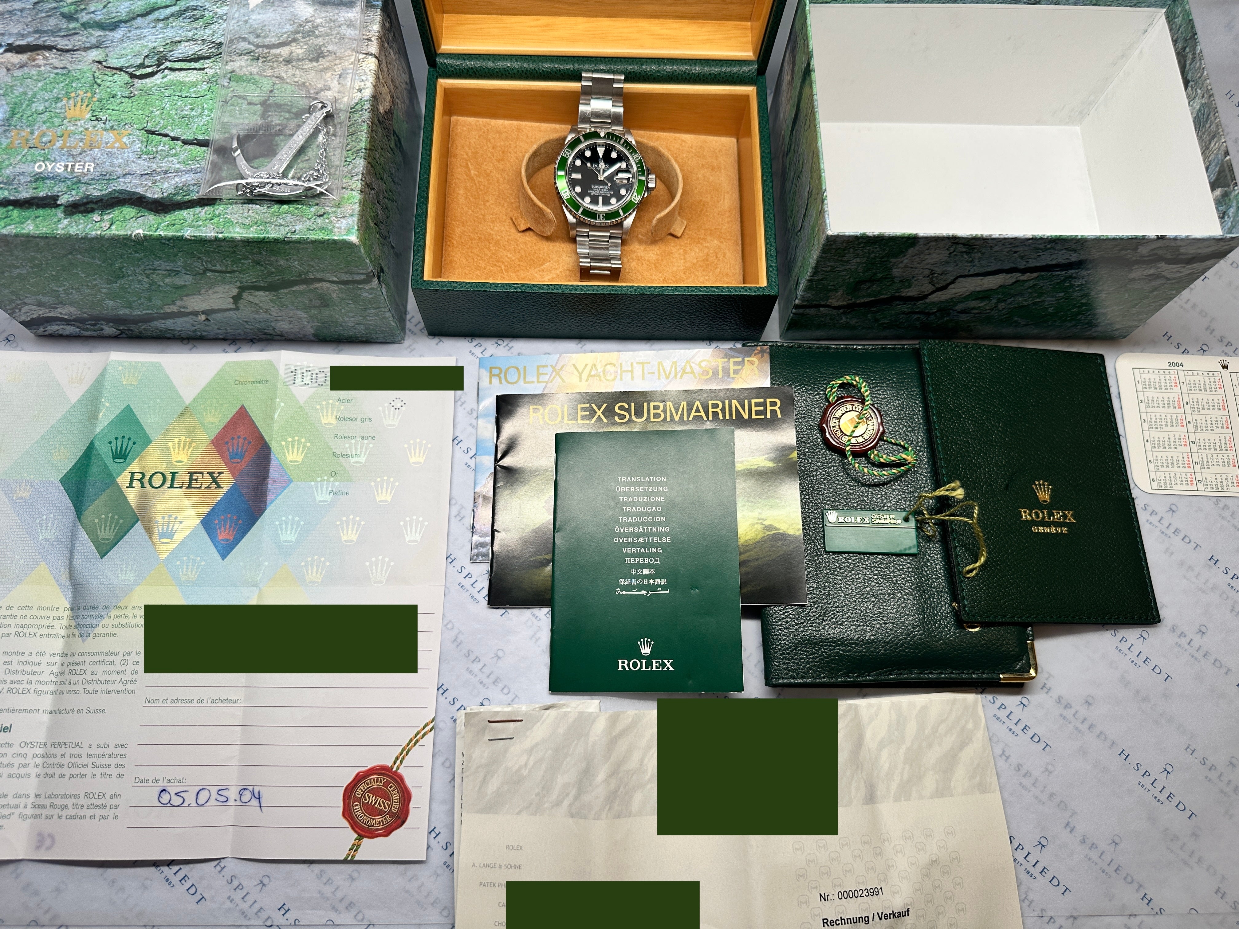 Rolex Submariner Date "Kermit" Flat4 aus dem Jahr 2004 im Full Set, mit Papieren und Box