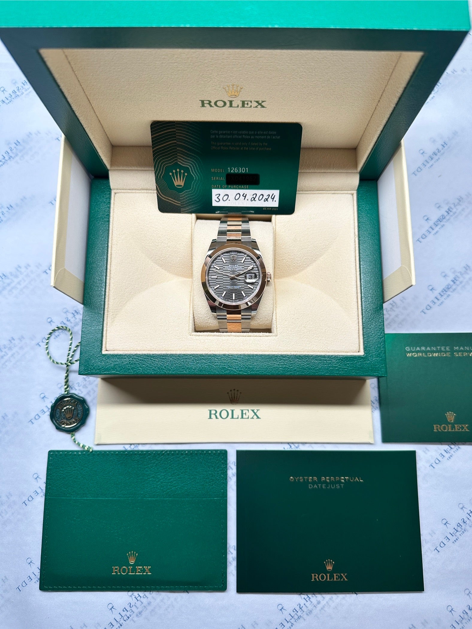 Rolex Datejust 41 in Stahl und Gold mit Wabenmuster-Zifferblatt in der Originalverpackung