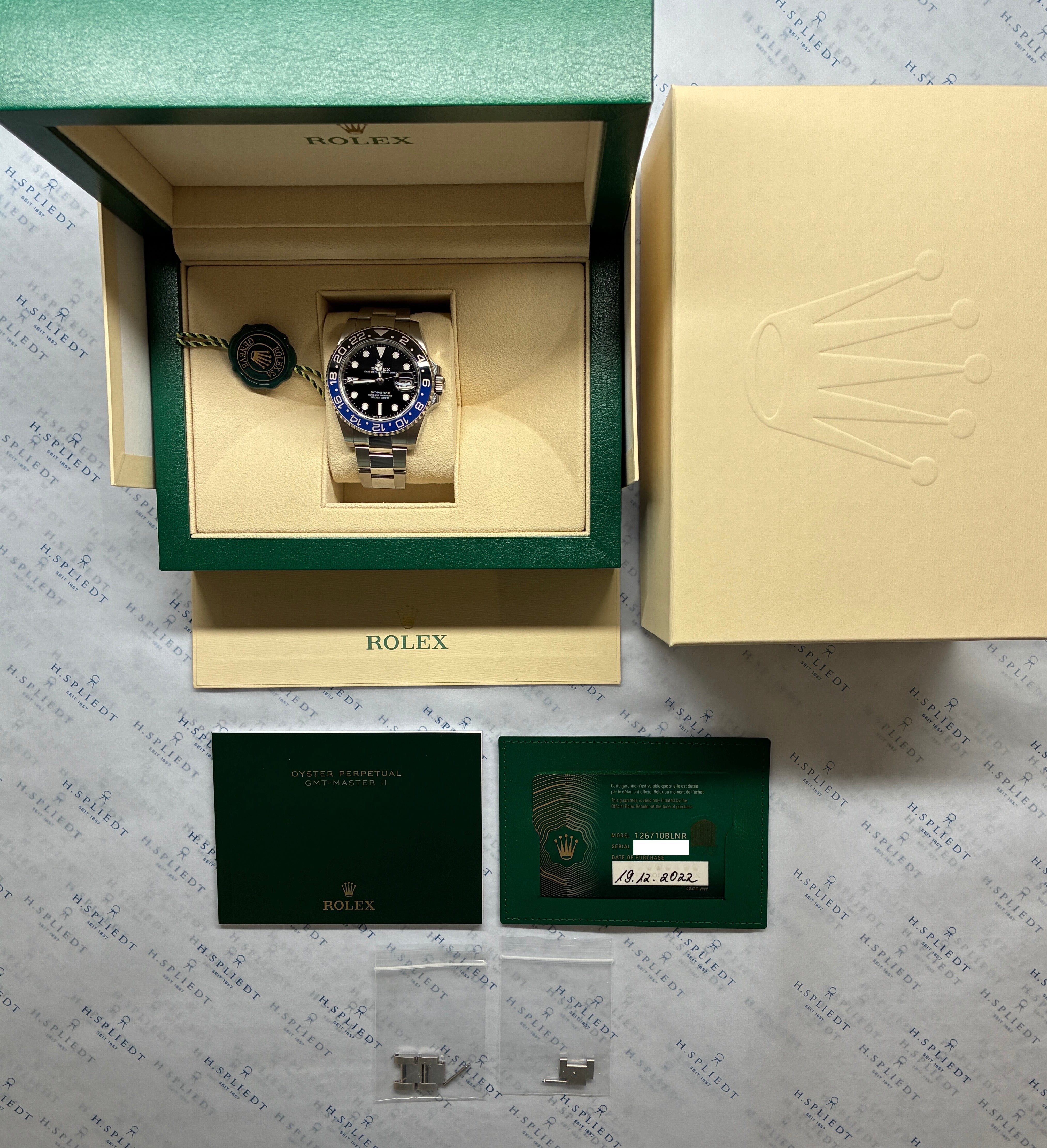 Rolex GMT-Master II Batman mit schwarzem Zifferblatt und blau-schwarzer Lünette im Full-Set