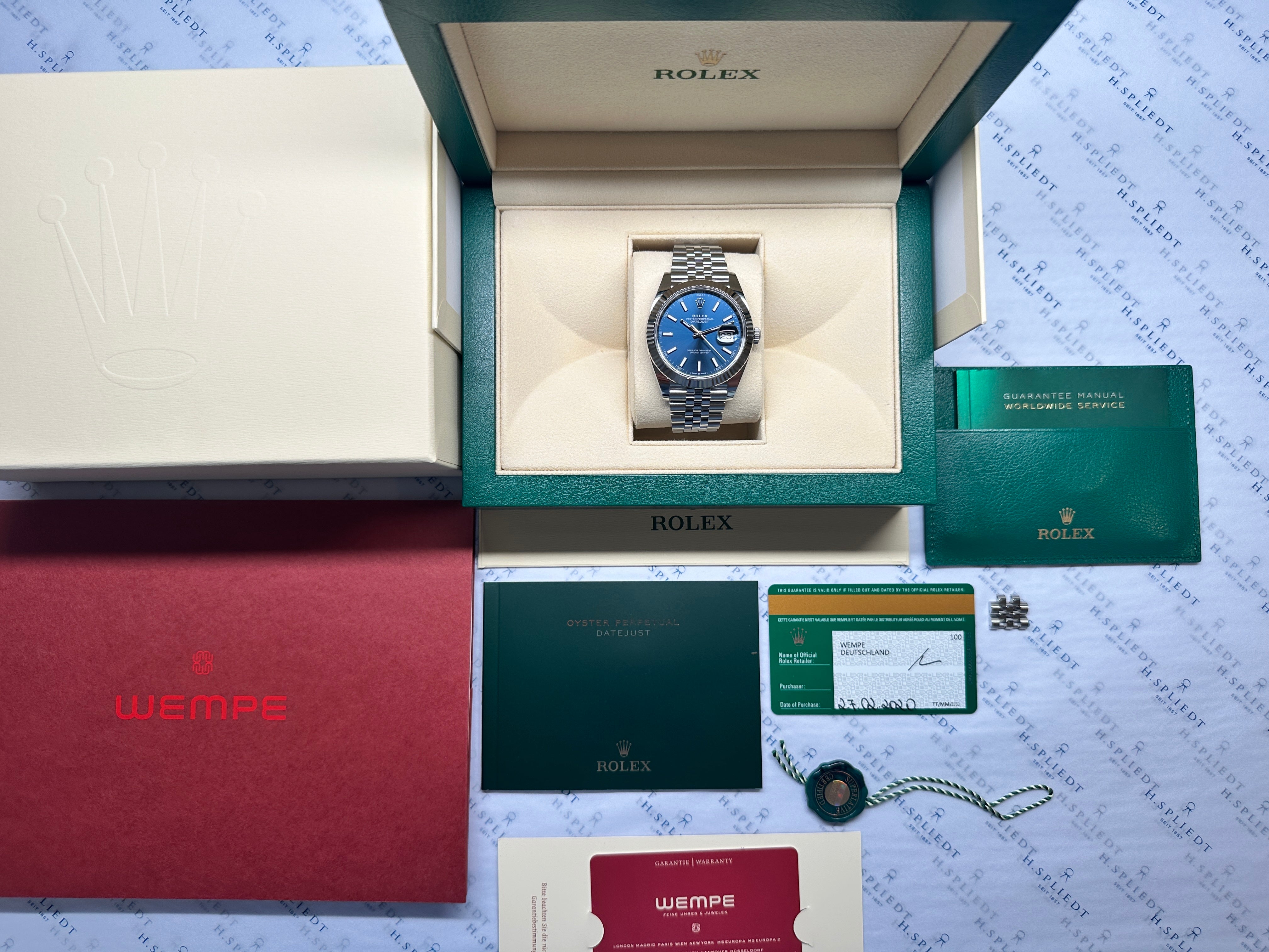 Rolex Datejust 41 mit blauem Zifferblatt in Stahl, komplett mit Box und Papieren