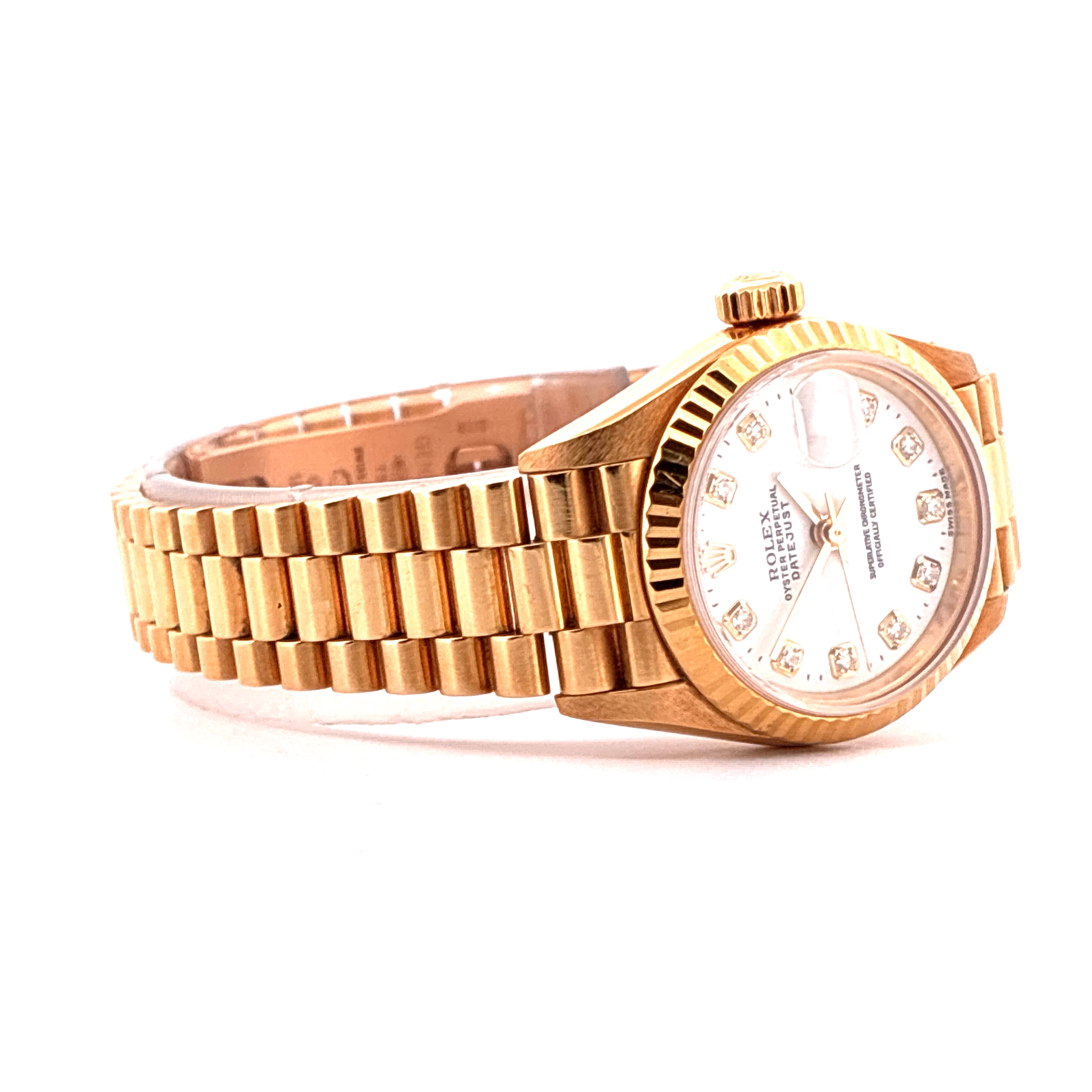 Rolex Lady-Datejust aus Gelbgold mit Diamanten-Indexen, Automatikwerk und Präsidentenband auf weissem Hintergrund