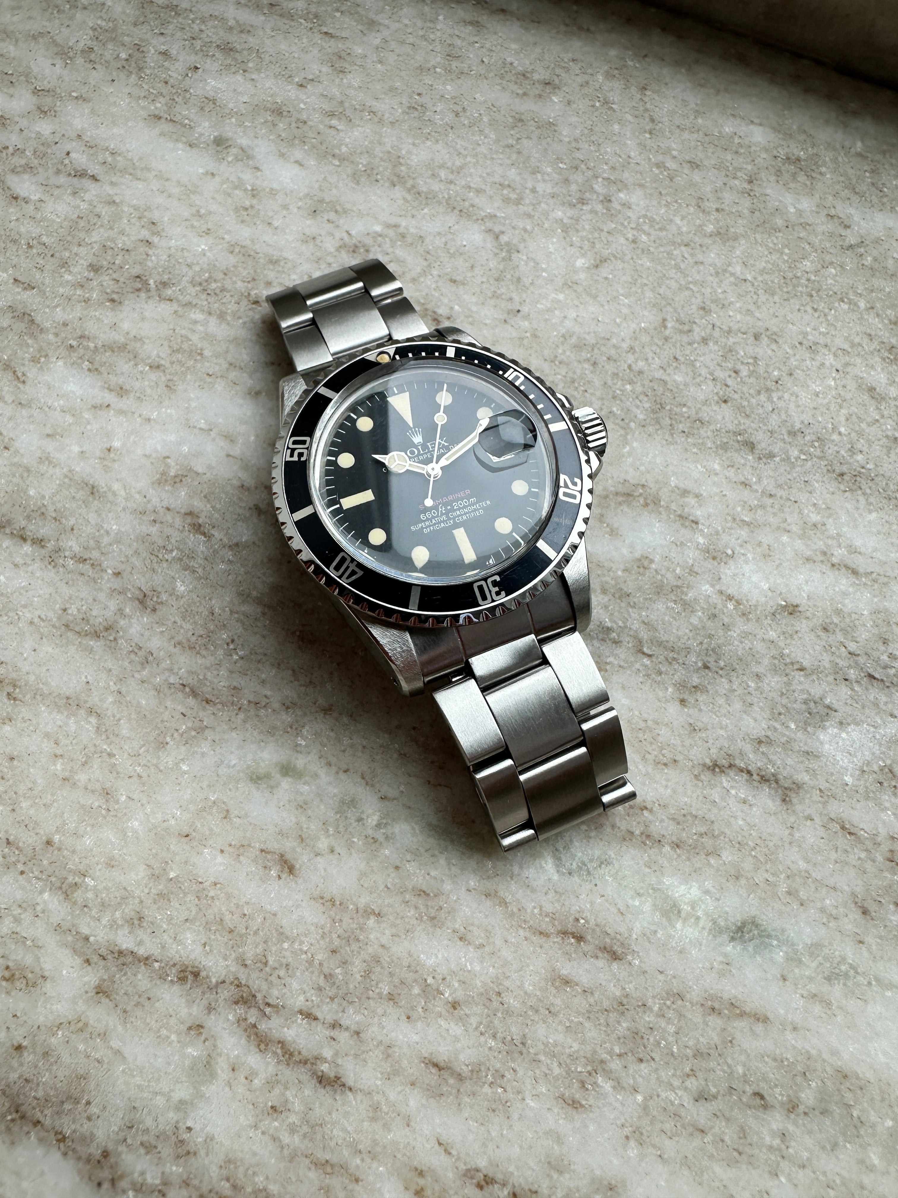 Rolex Submariner Date MK5 Ref 1680 Baujahr 1972 Stahl Automatik auf Marmor