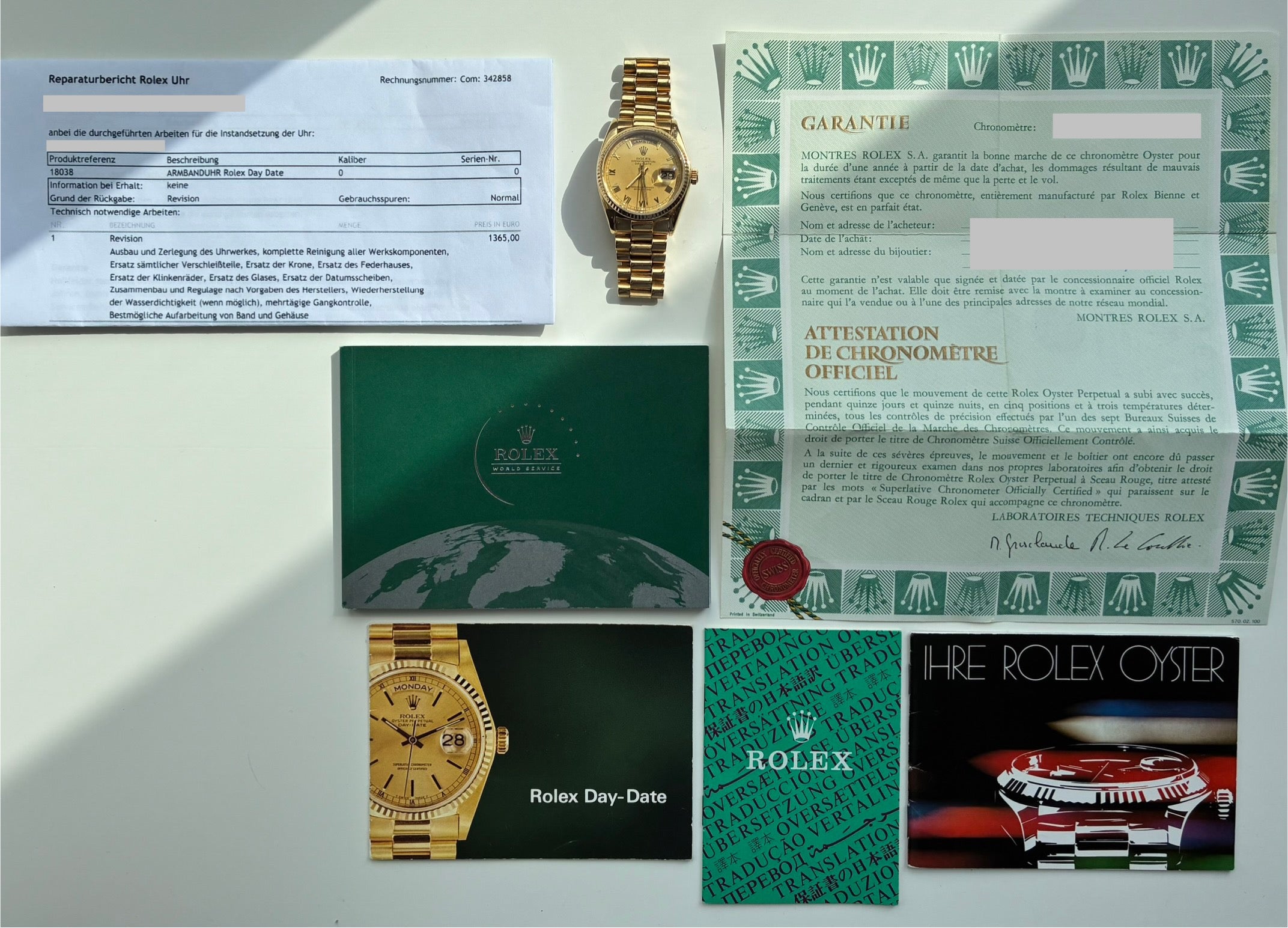 Eine goldene Rolex Day-Date 36mm mit Servicerechnung und Garantiepapieren