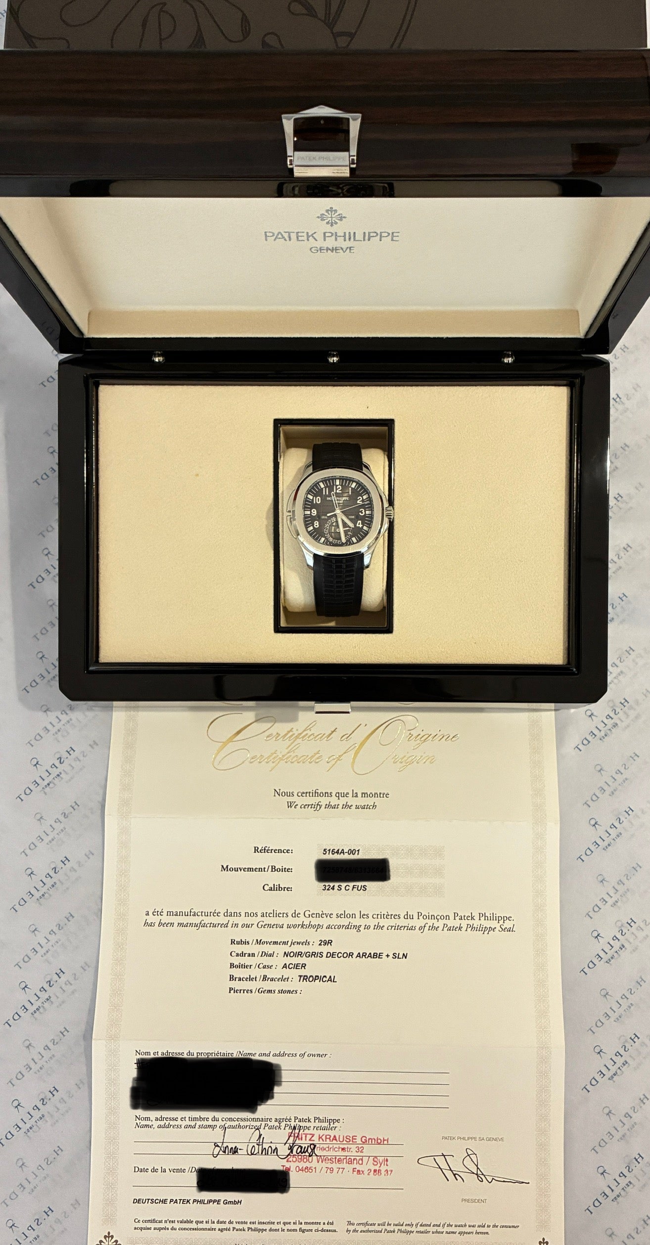 Patek Philippe Aquanaut Travel Time 5164A-001 / 2019 Full-Set