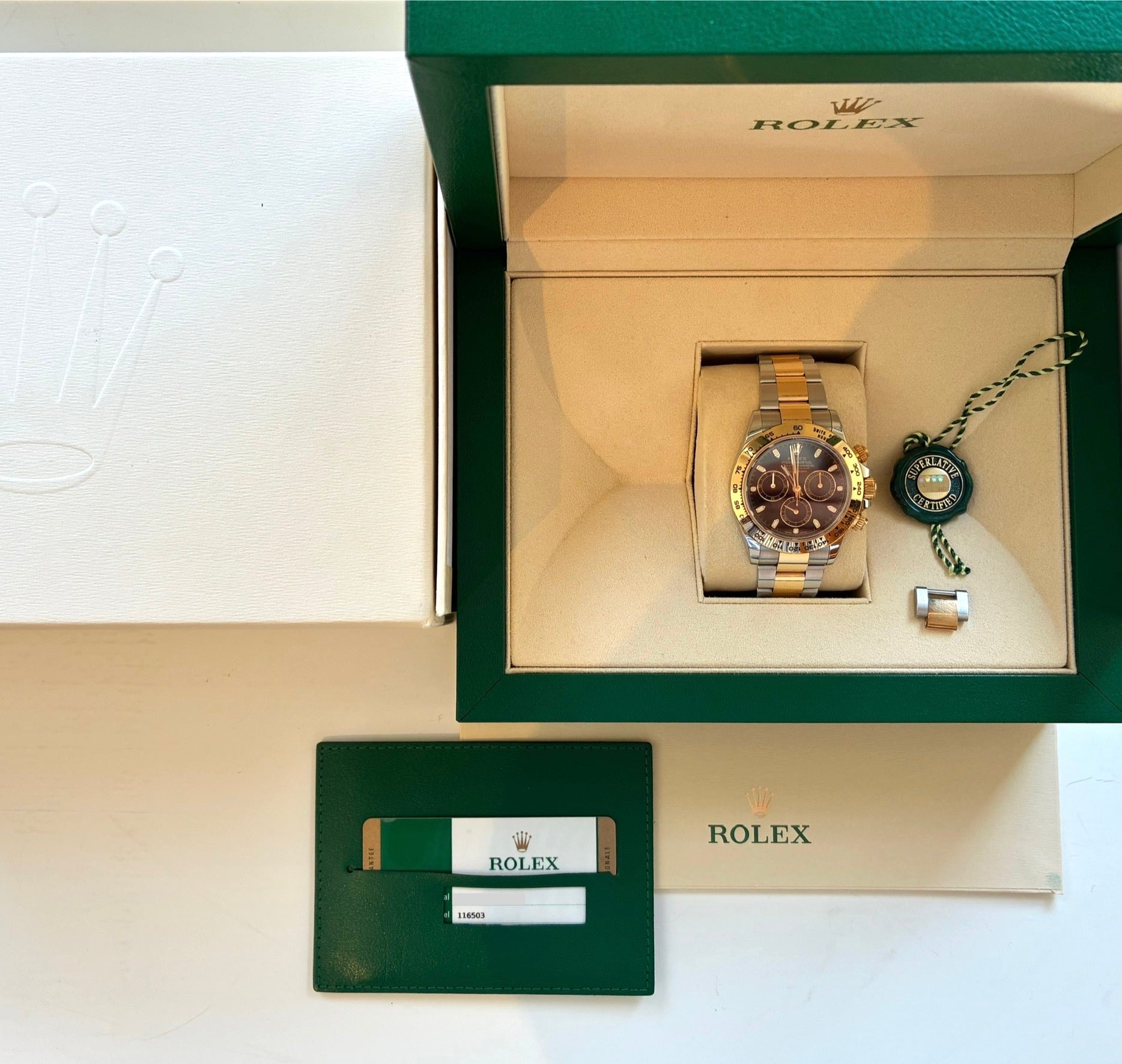 Rolex Daytona Bicolor (2016) in Box mit Papieren und Gruener Lederkarte