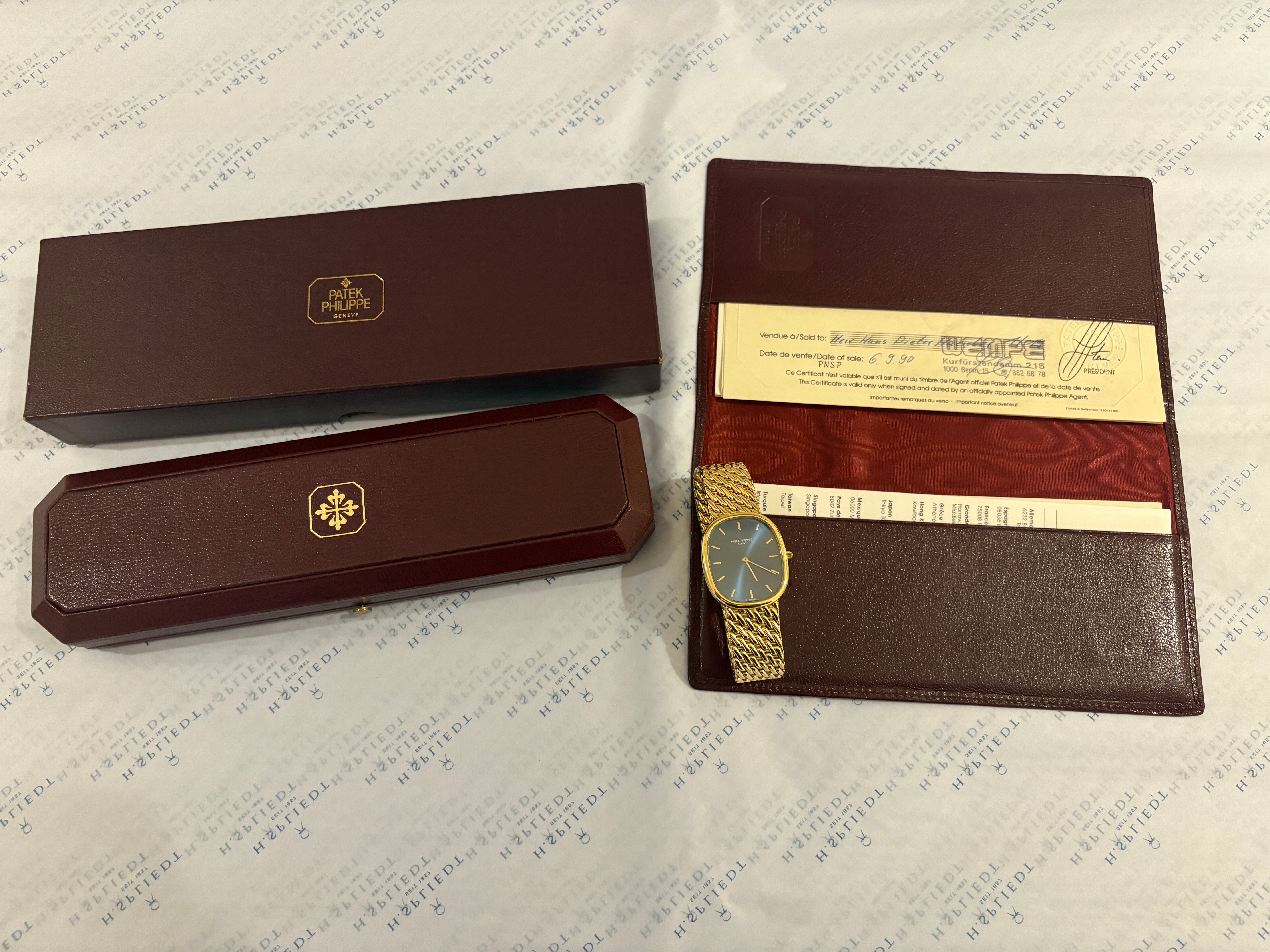 Patek Philippe Ellipse 18kt Gelbgold mit Zertifikat und Box im Lederetui