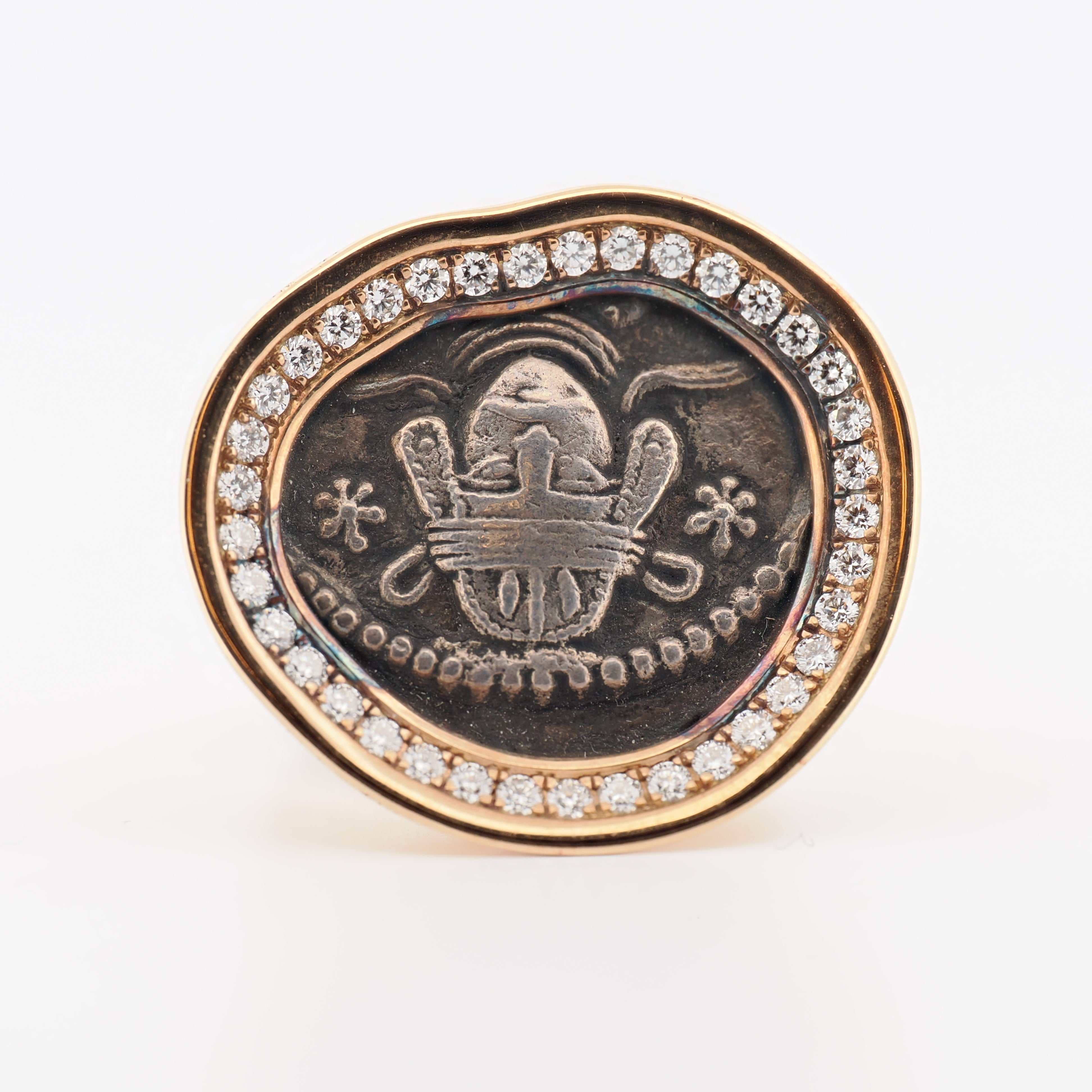 Ring in Roségold mit Münze und Brillanten