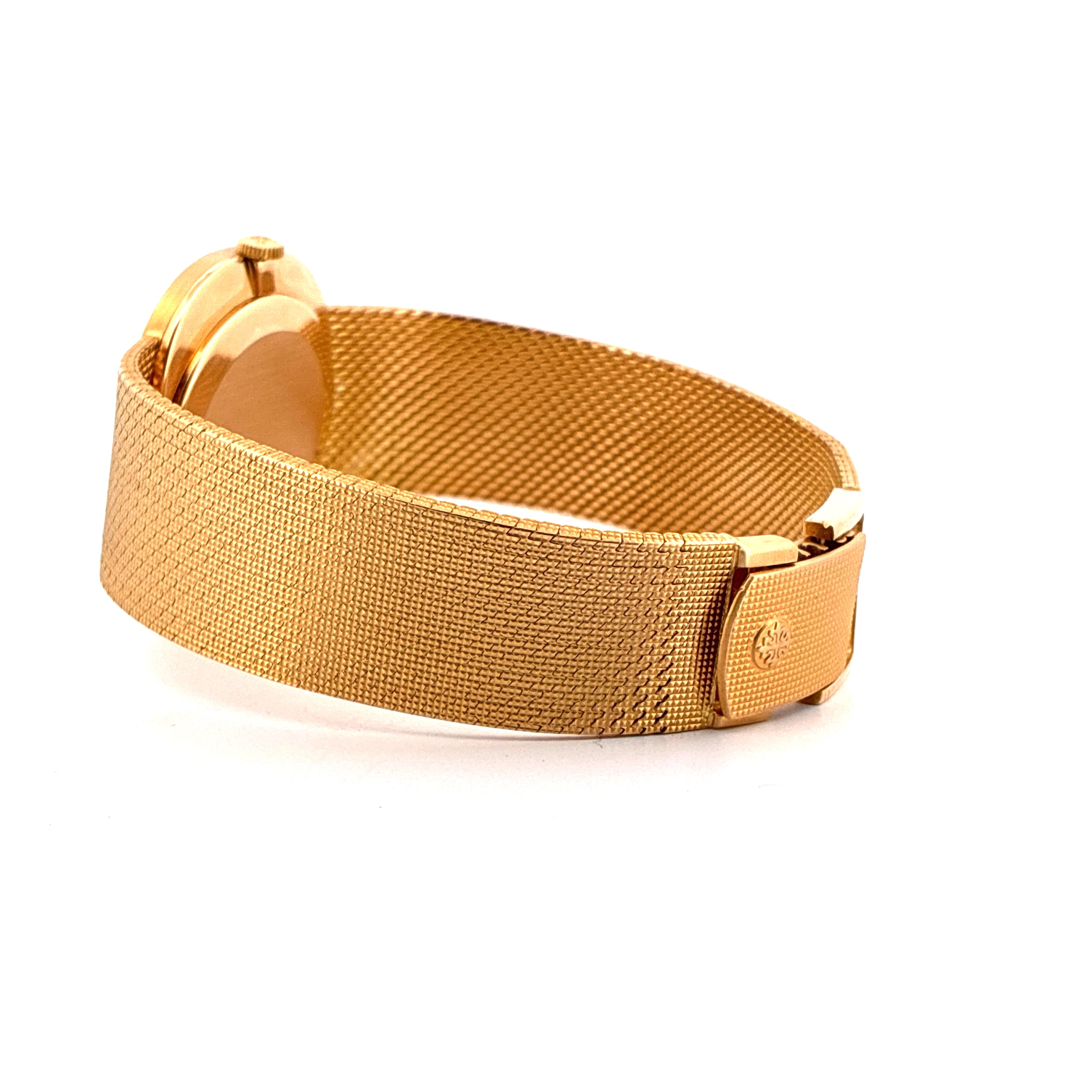 Patek Philippe Ellipse d'Or aus Gelbgold im Vintage-Stil mit feinem Milanaise-Armband und eleganter Schließe