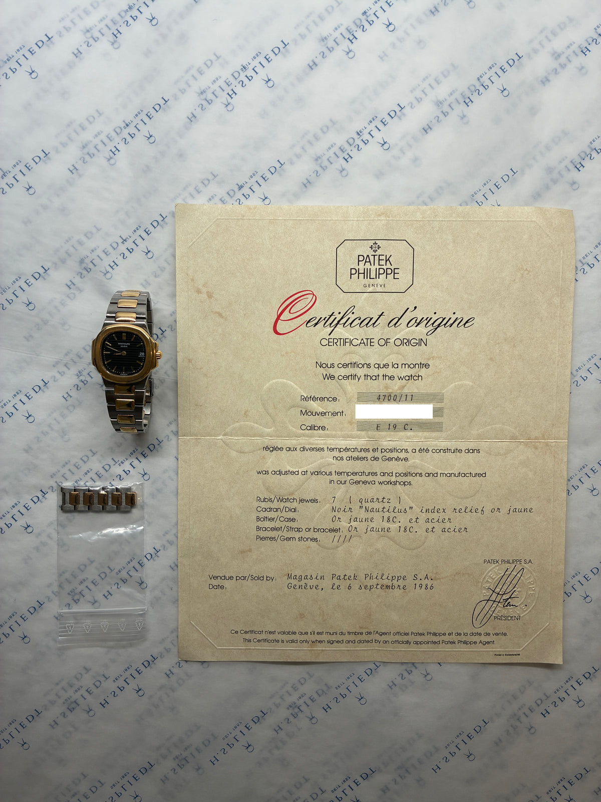 Nautilus / very rare / Sigma dial / Bicolor / Papers / 1986