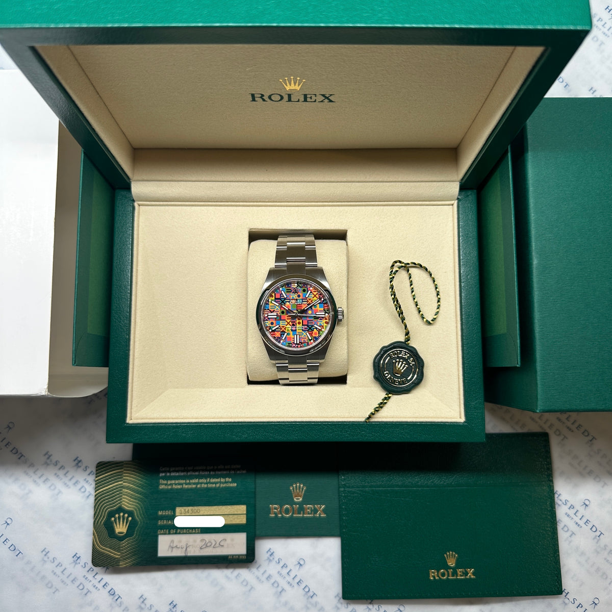 Oyster Perpetual 41 Multicoloured Jubilee Motif Dial 134300 / Unworn / Box and Paper / Aug. 2026 - Juwelier Spliedt