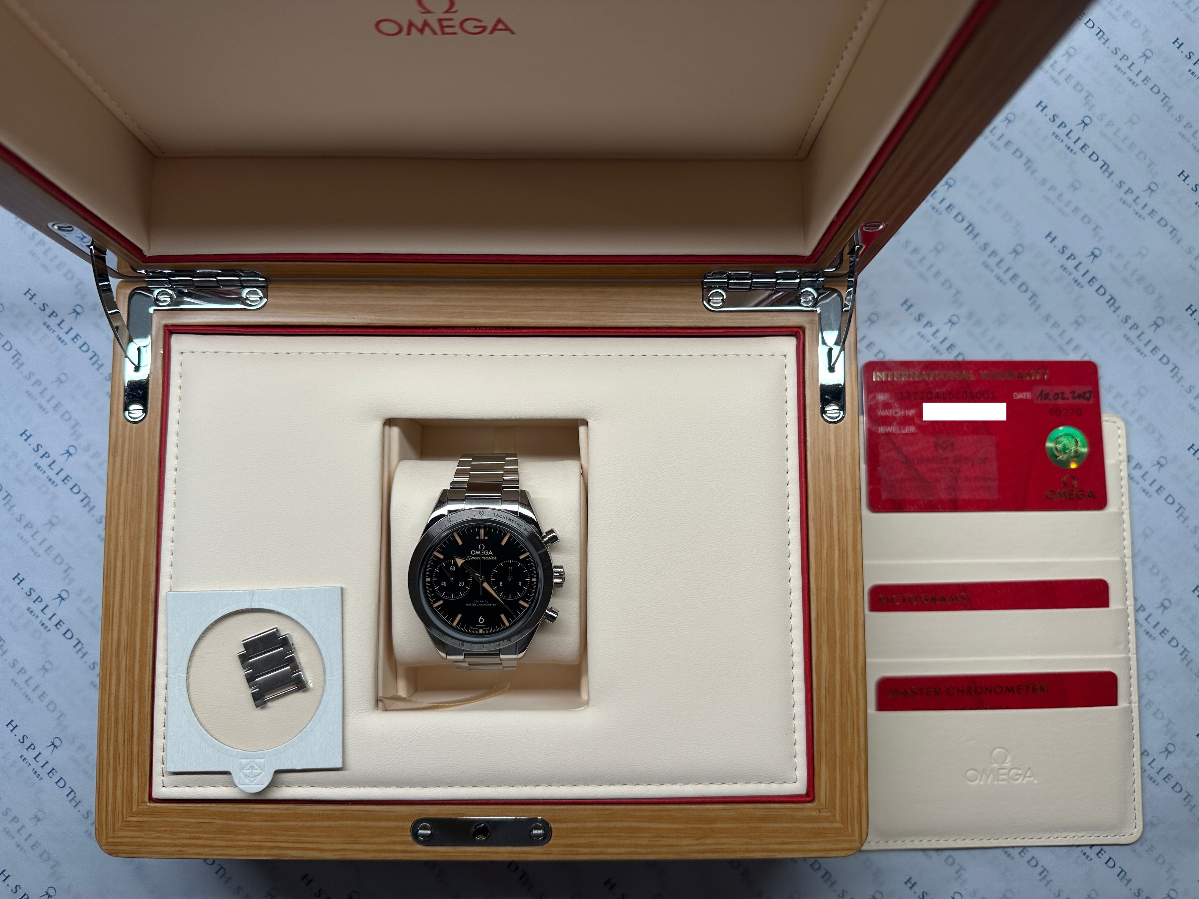 Speedmaster 57 "Sandwich Dial" / Box and Paper / premium Zustand / -2023-