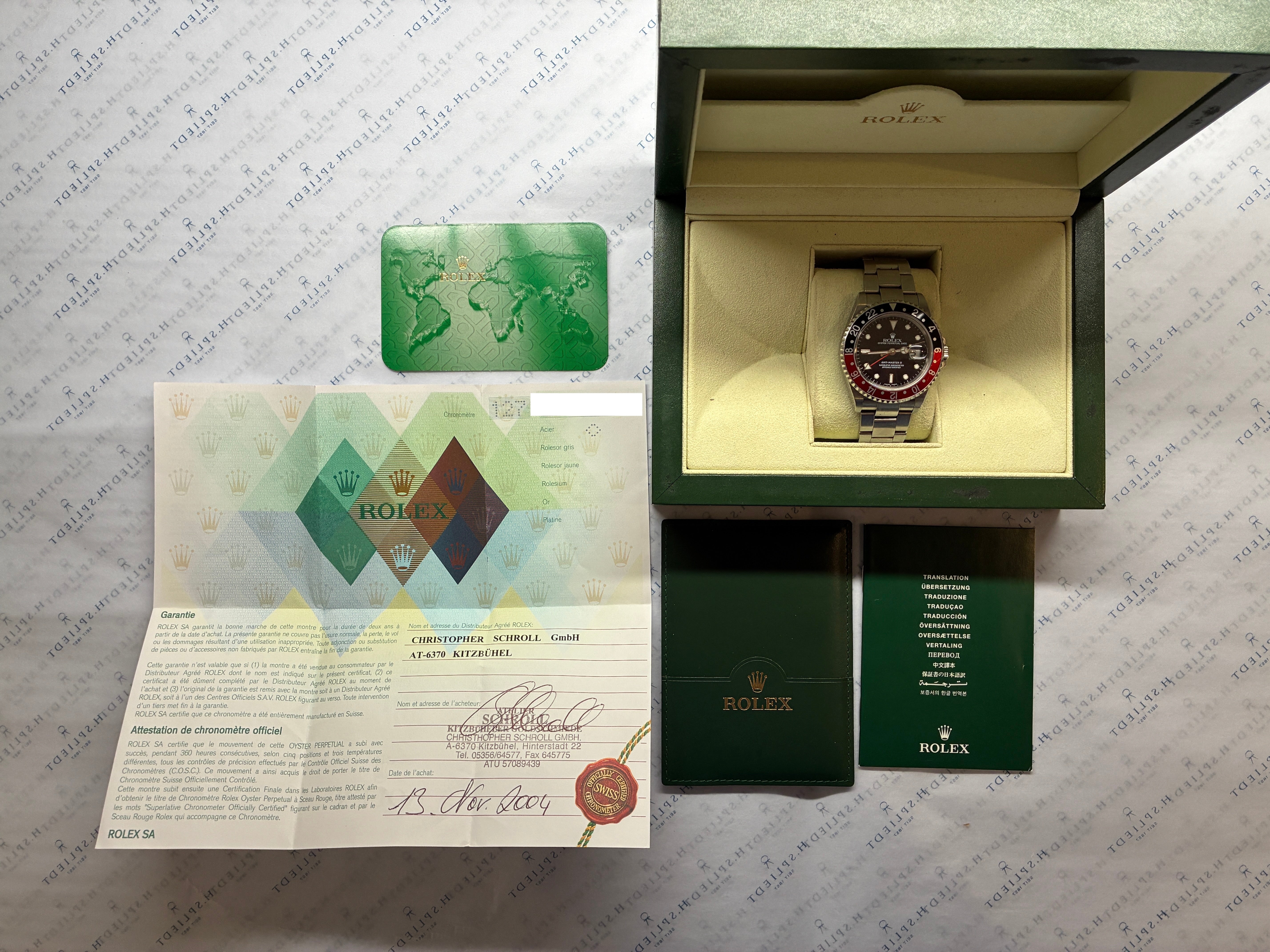 Rolex - GMT-Master II / T-Series / Coke / Box & Papers / 2004 - [product_sku]