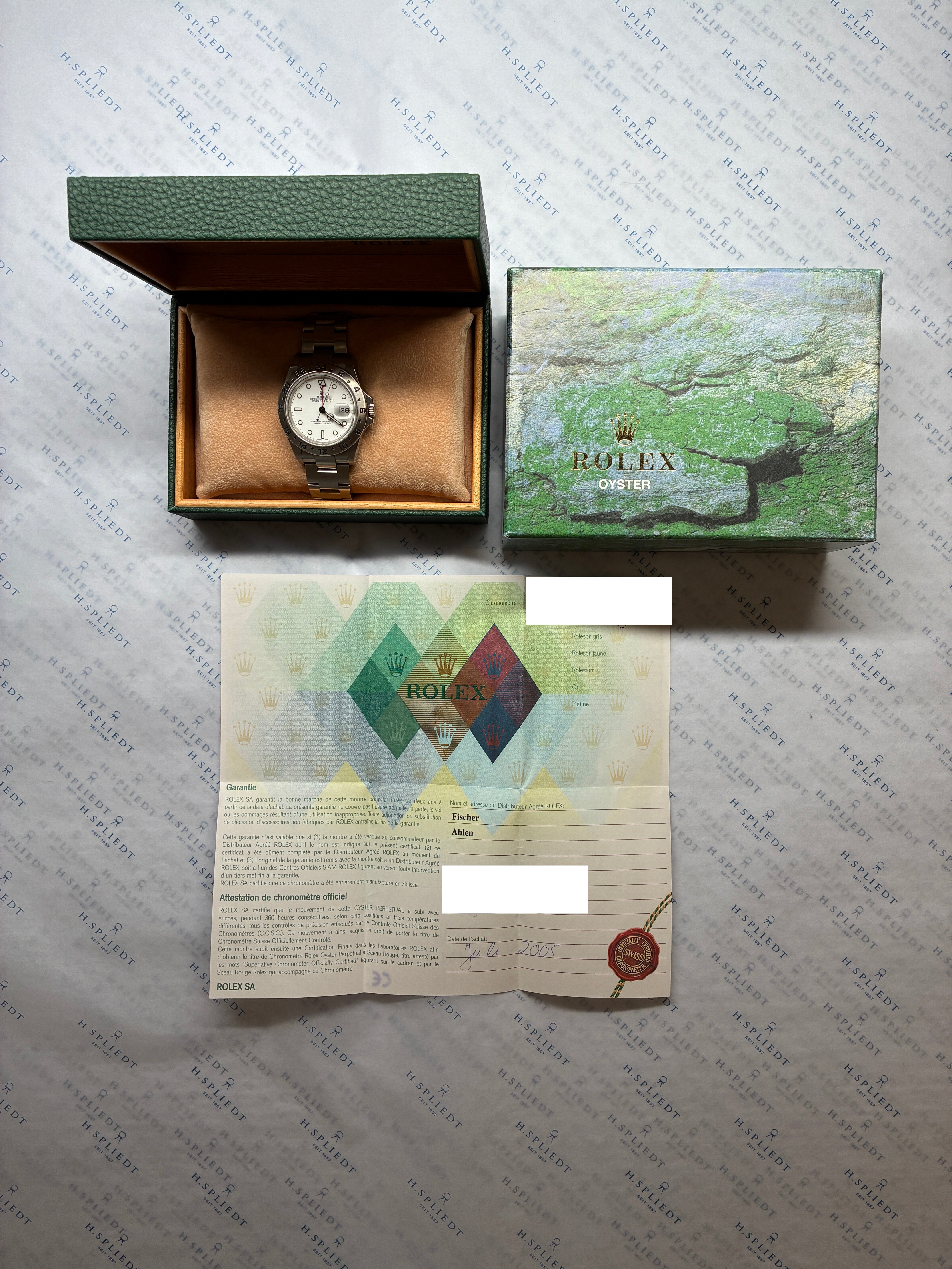 Rolex Explorer II mit weißem Zifferblatt, Stahlgehäuse und Armband, inklusive Box und Papieren